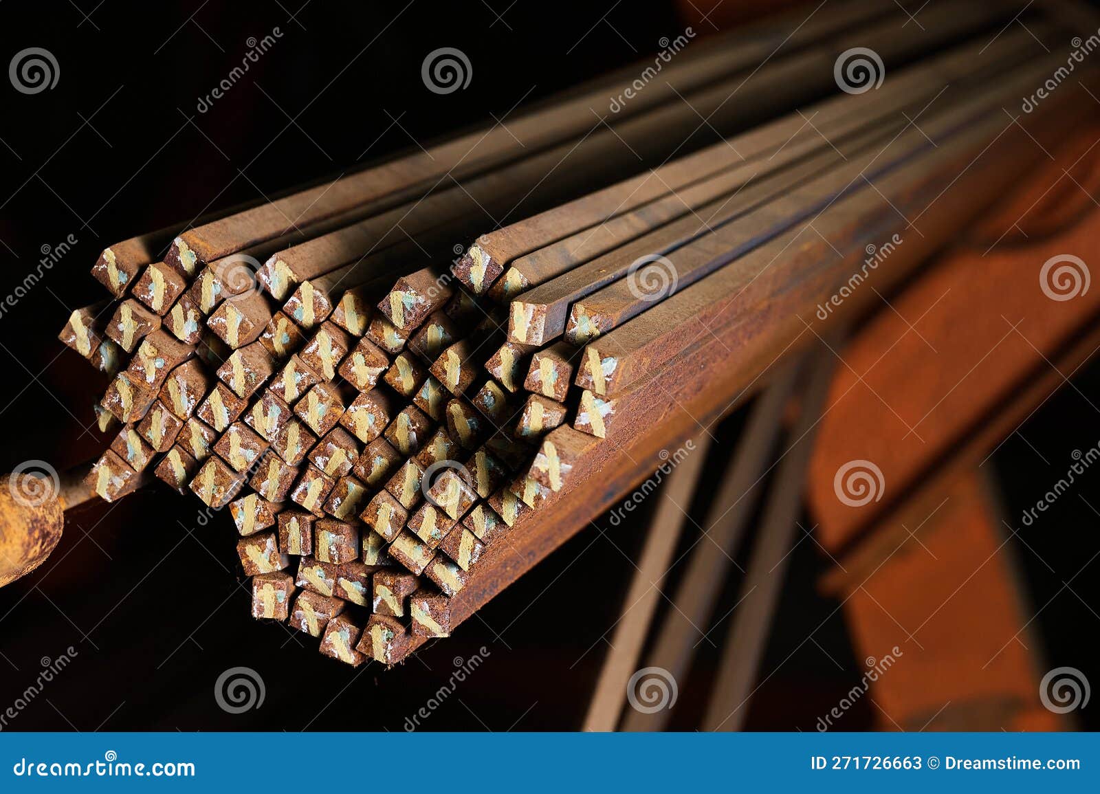 Thin Metal Rods Bunch in Cold Plant Warehouse Macro View Stock