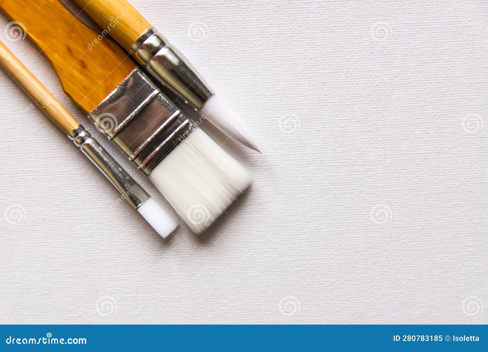 Thin and Thick Synthetic Painting Brushes on White Background Stock