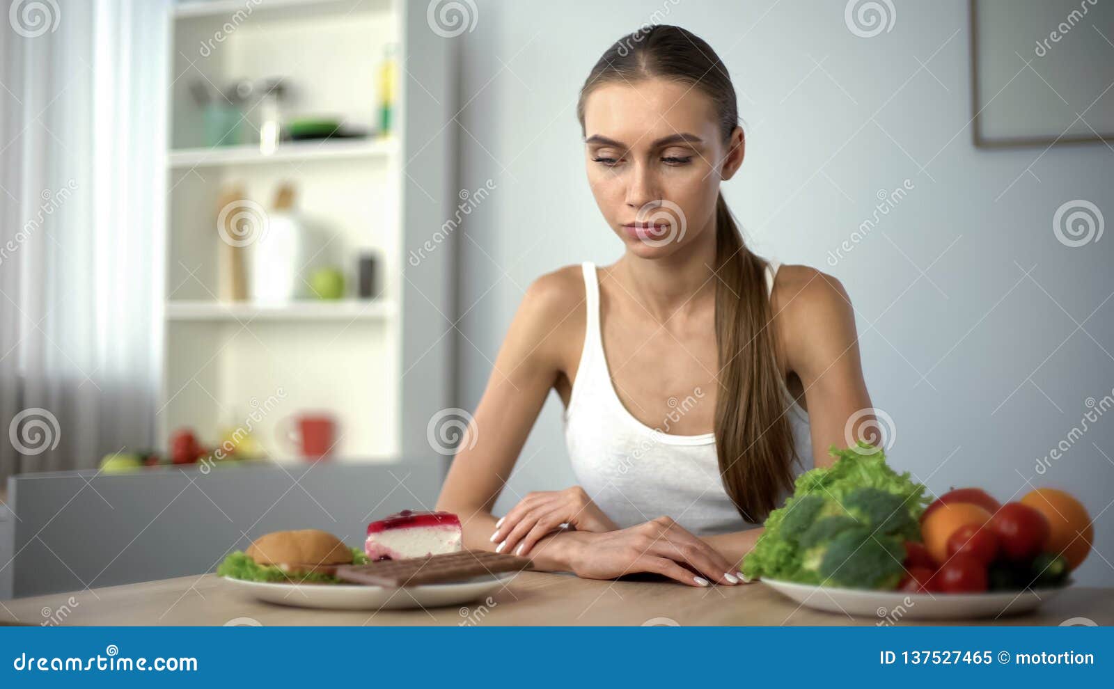 Thin Woman Choosing between Junk Food and Healthy Vegetables ...