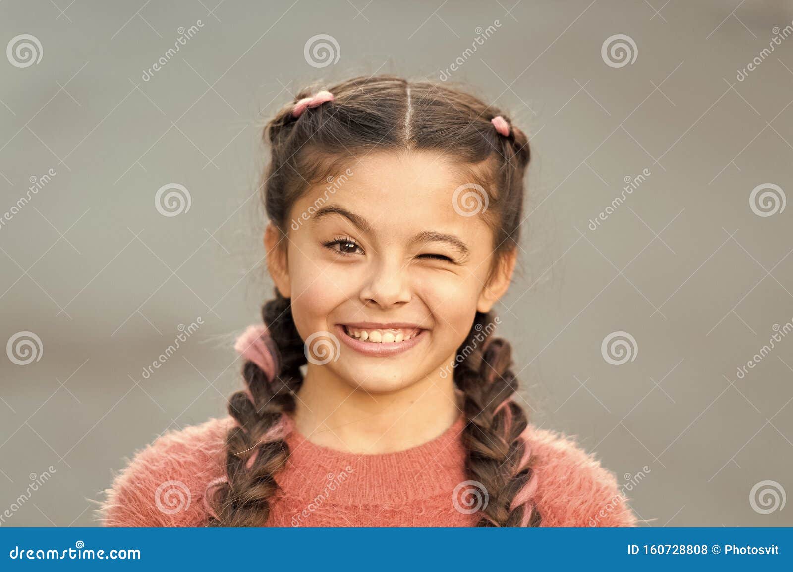things gonna be alright. girl wink cheerful face grey background. kid girl cheerful satisfied with everything. cheerful