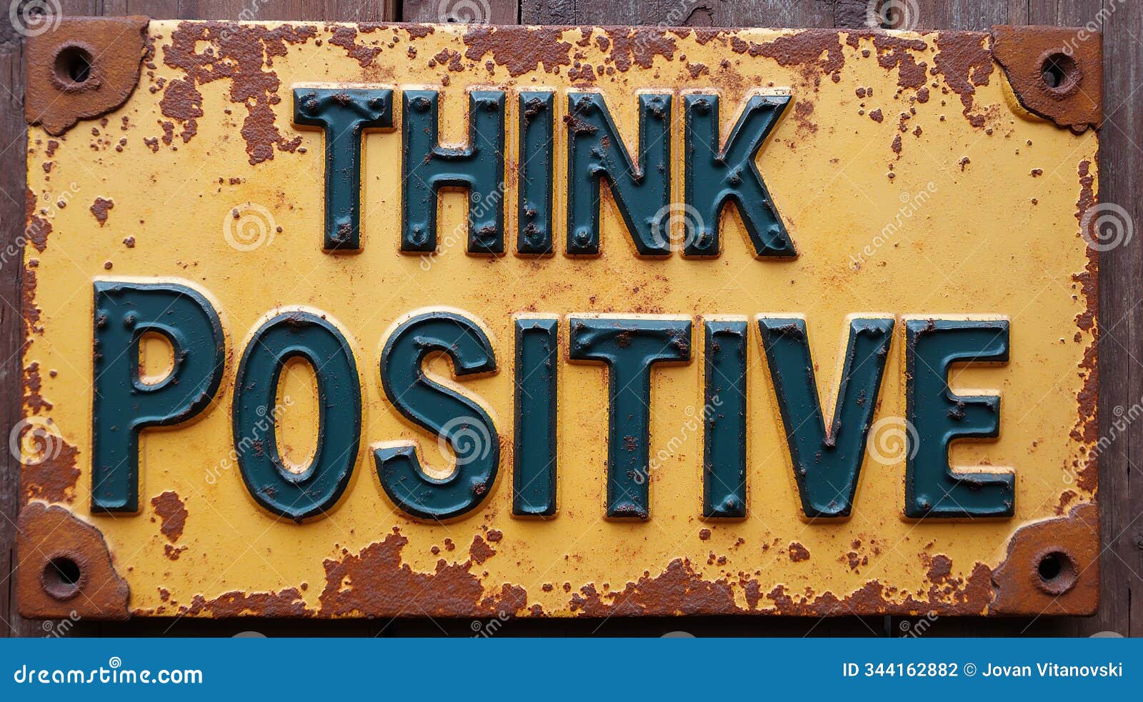 think positive inspirational message on rustic metal sign
