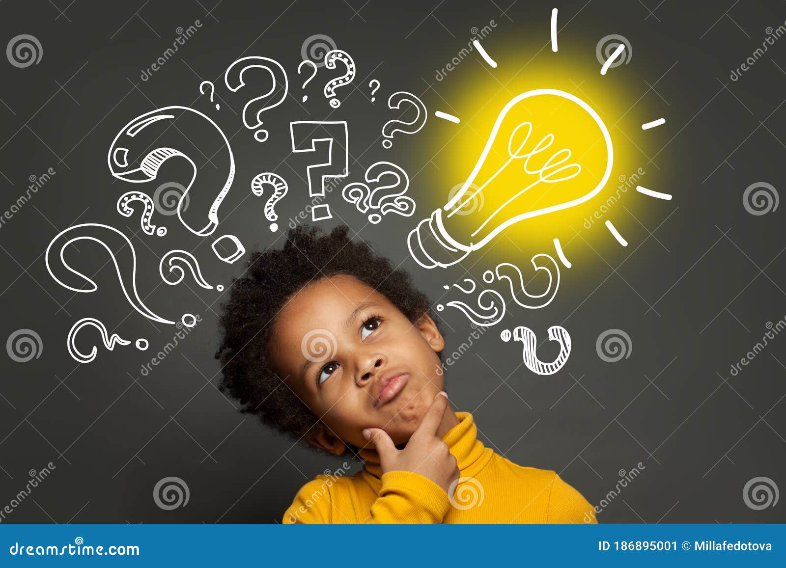 thinking child boy on black background with light bulb and question marks. brainstorming and idea concept