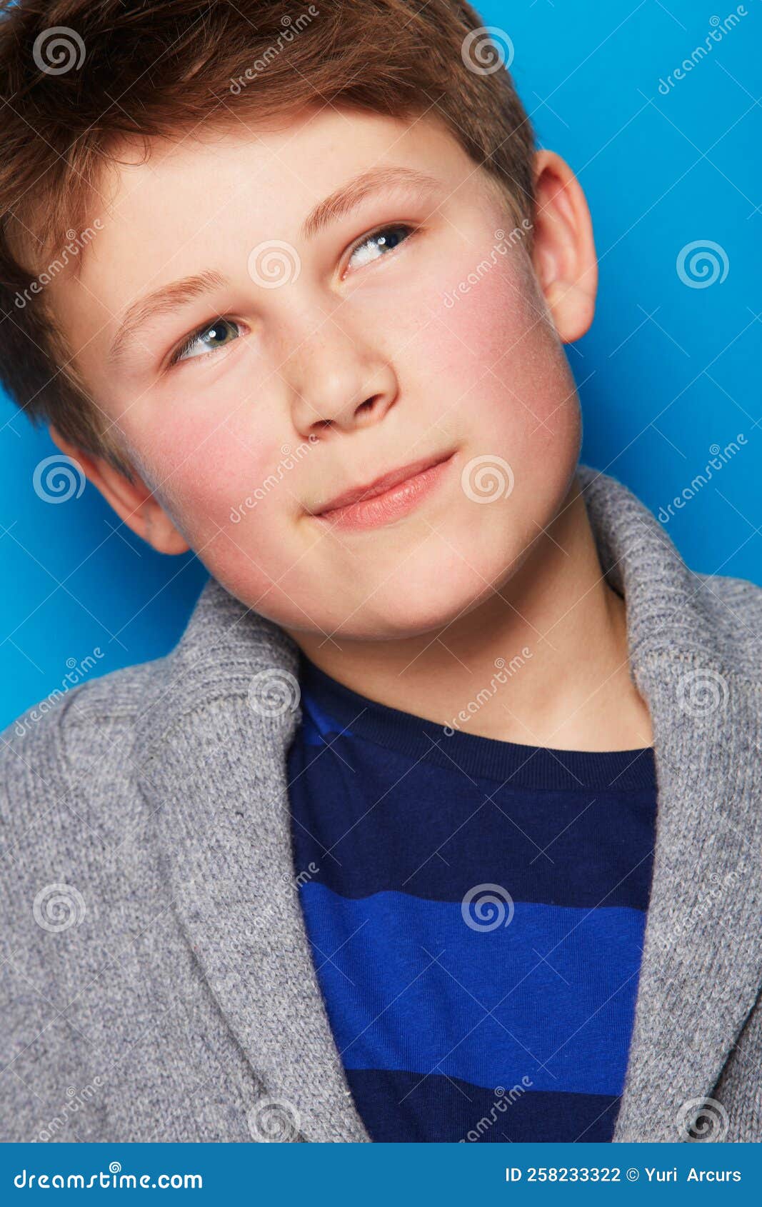 Thinking about the Future. a Young Boy Looking Away. Stock Photo