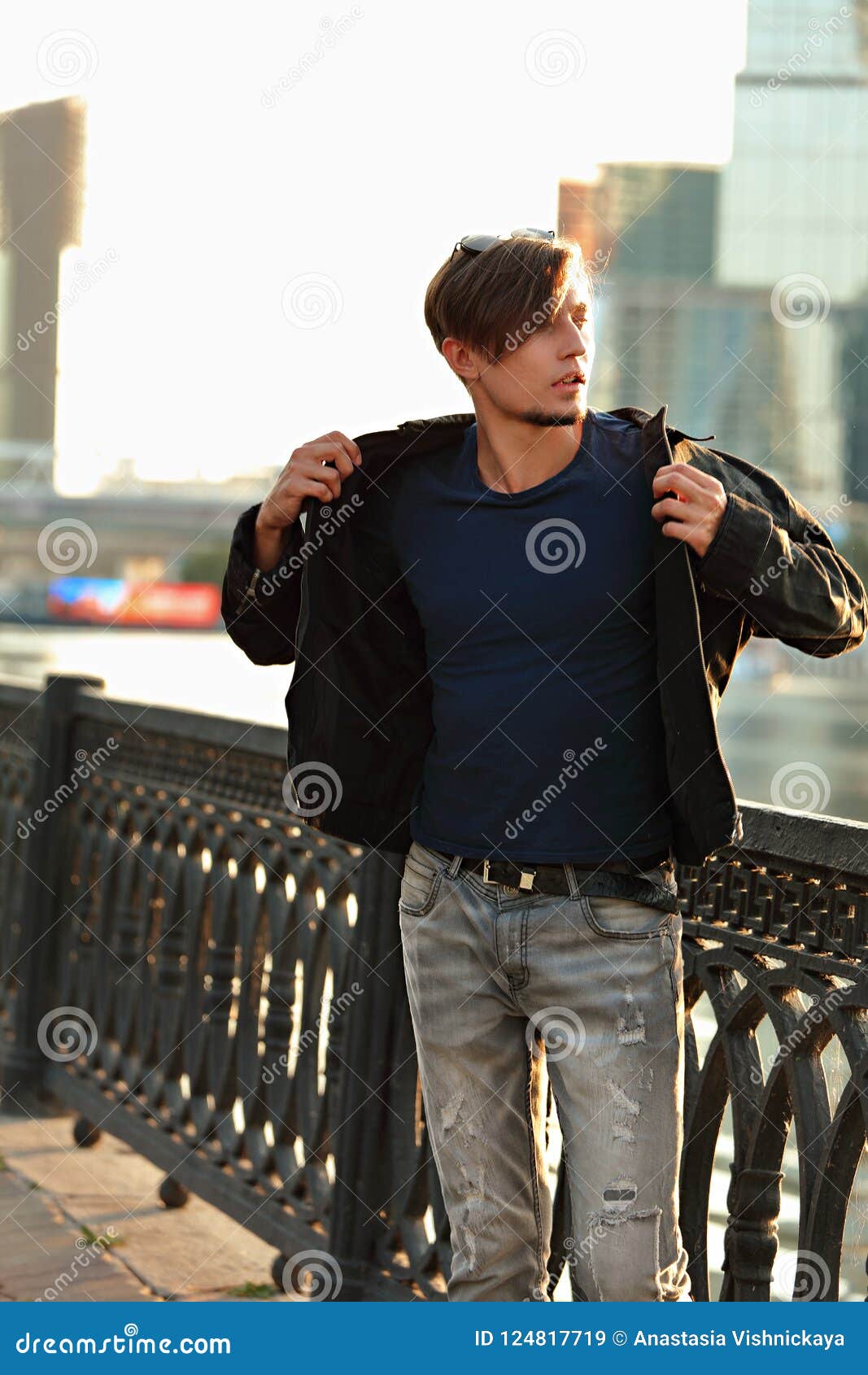 Thinking Handsome Young Man Walking In Fashion Jeans And Dressing The ...