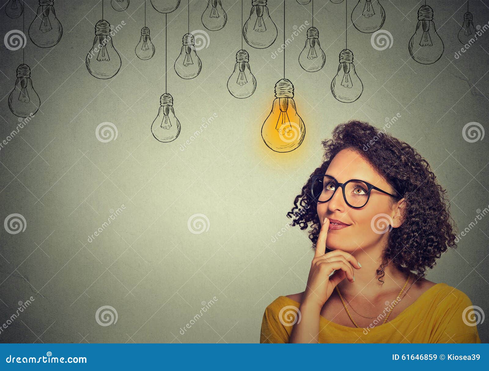 thinking woman in glasses looking up with light idea bulb above head