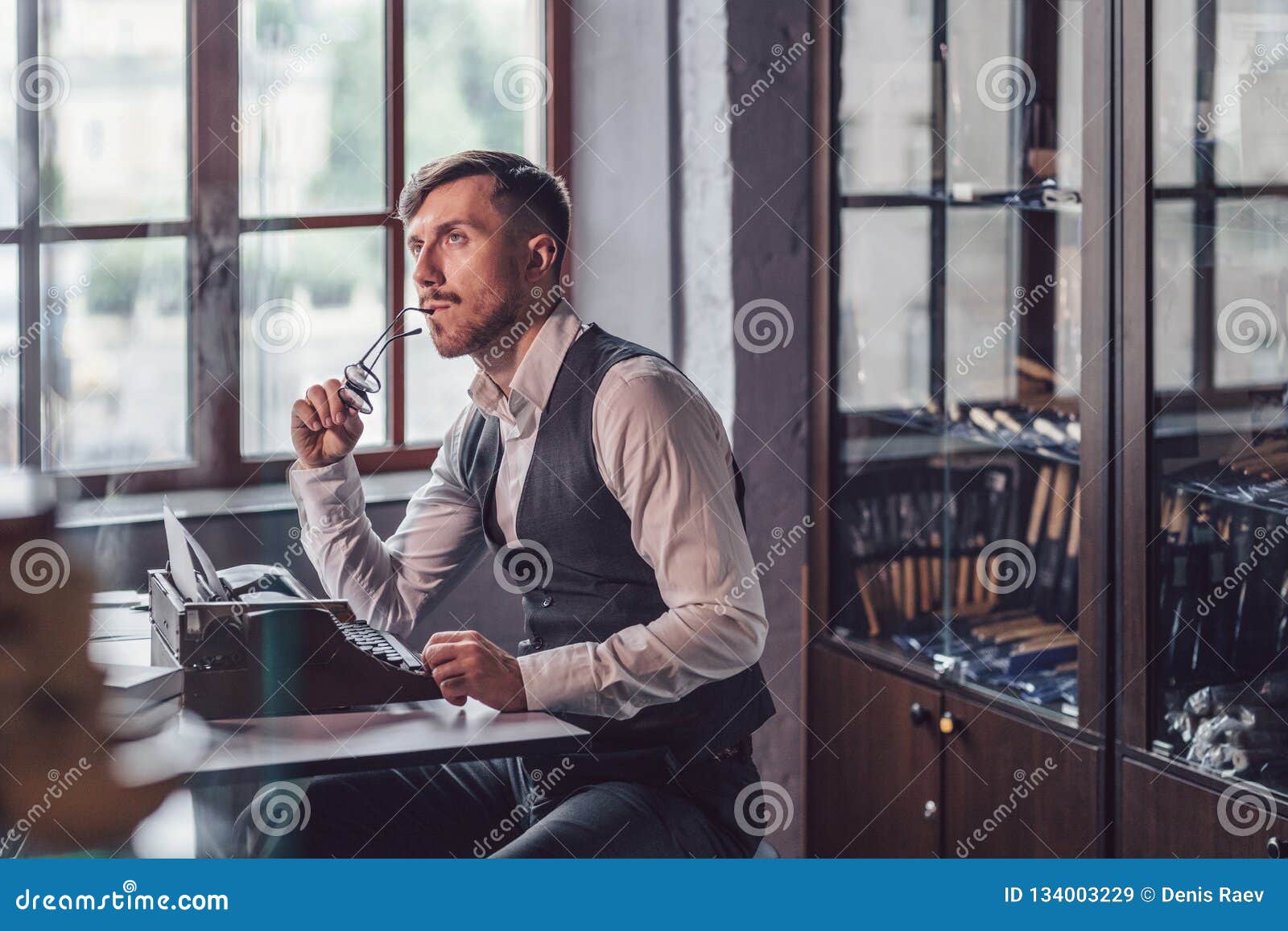Thinking Young Writer with a Retro Typewriter Stock Image Image of