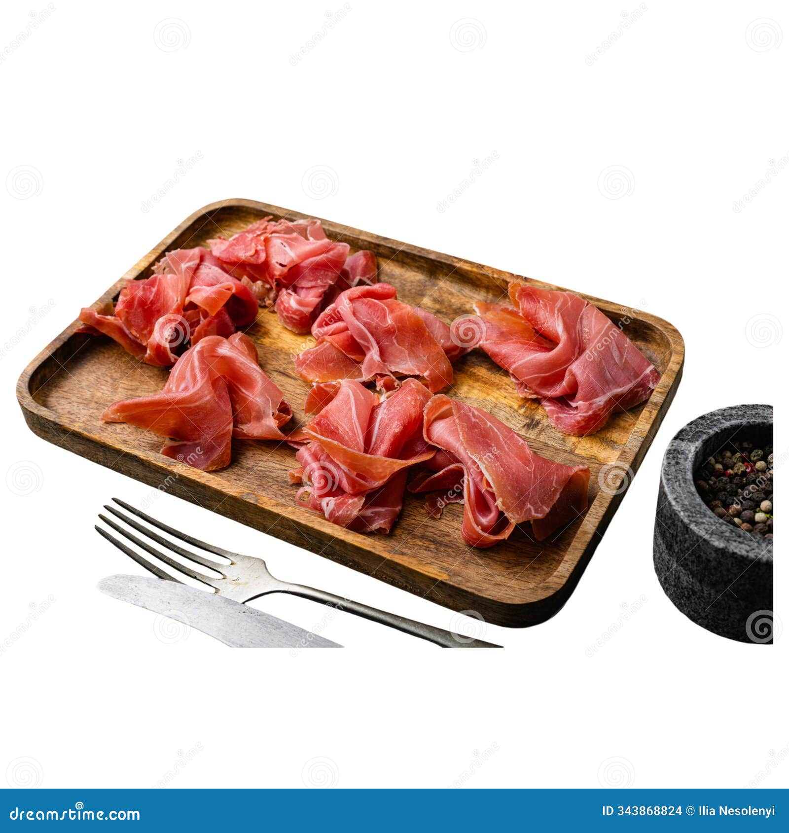 thinly sliced cured meat is beautifully arranged on a wooden platter, complemented by a fork and a stone pepper mil