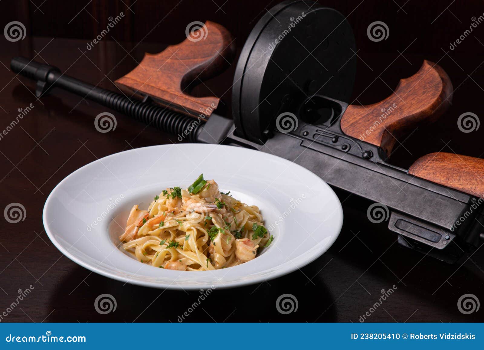 https://thumbs.dreamstime.com/z/thompson-submachine-gun-italian-pasta-prawns-chili-pepper-greens-dark-brown-table-vintage-mood-style-background-238205410.jpg