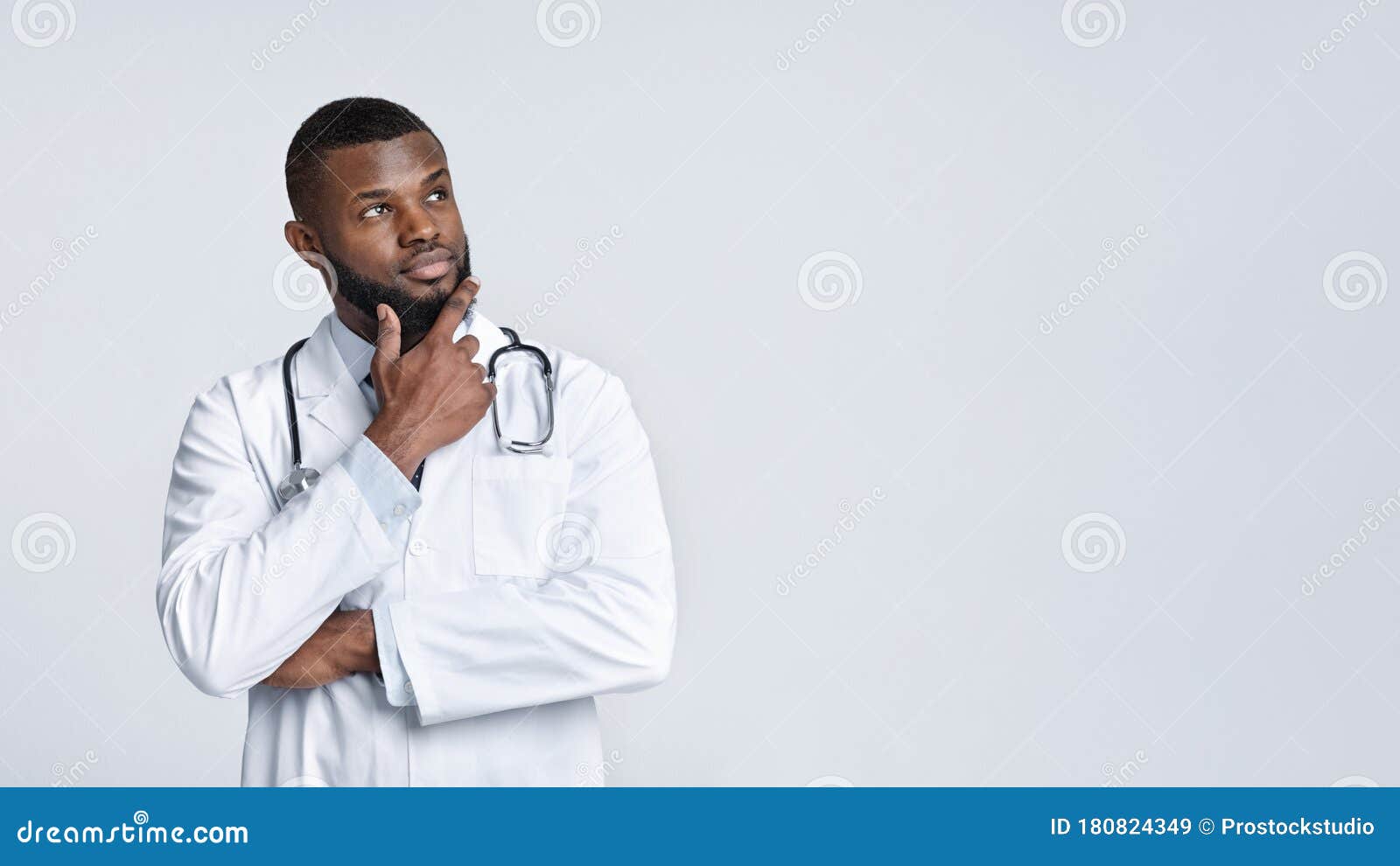 Thoughtful Black Doctor in White Uniform Looking at Copy Space Stock Image Image of doctor
