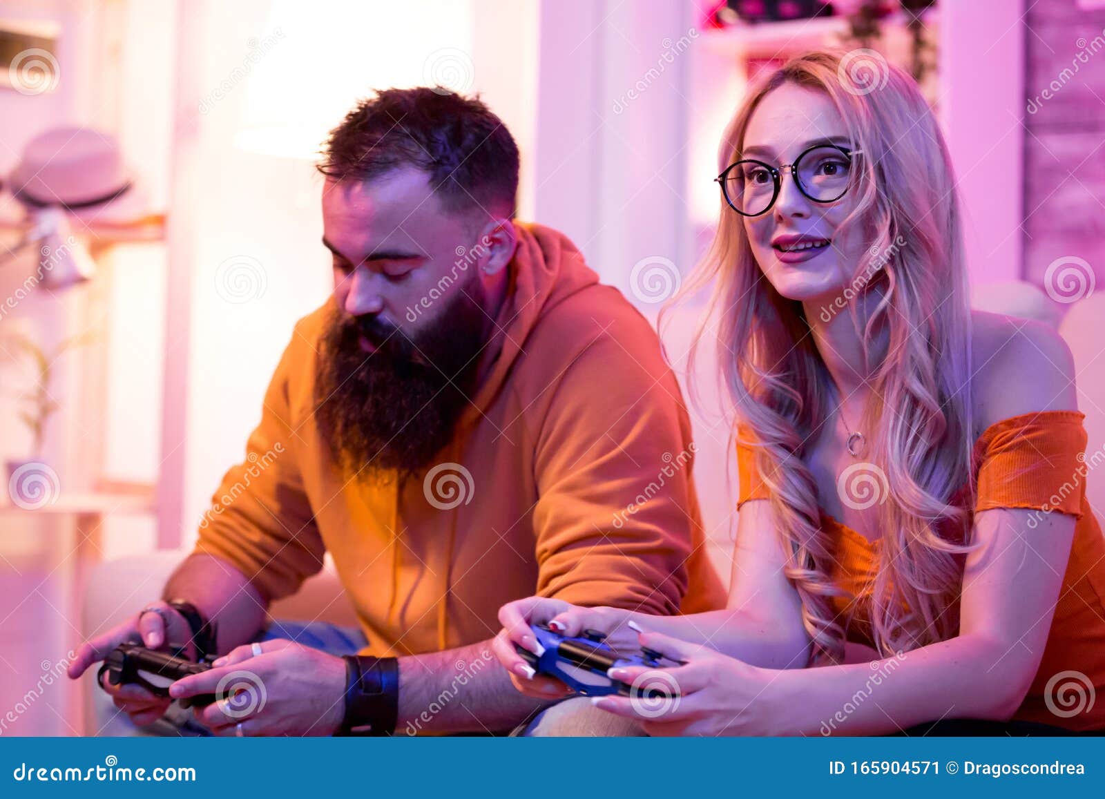 Thoughtful Boyfriend while Playing Online Games with Hig Beautiful  Girlfriend Stock Image - Image of expression, couple: 165904571