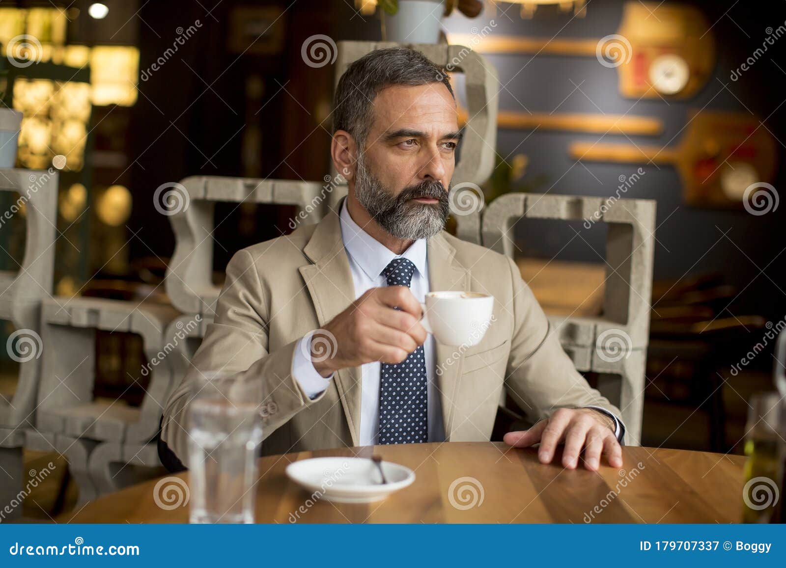 Thoughtful Handsome Mature Businessman Drinking Coffee In Cafe Stock ...
