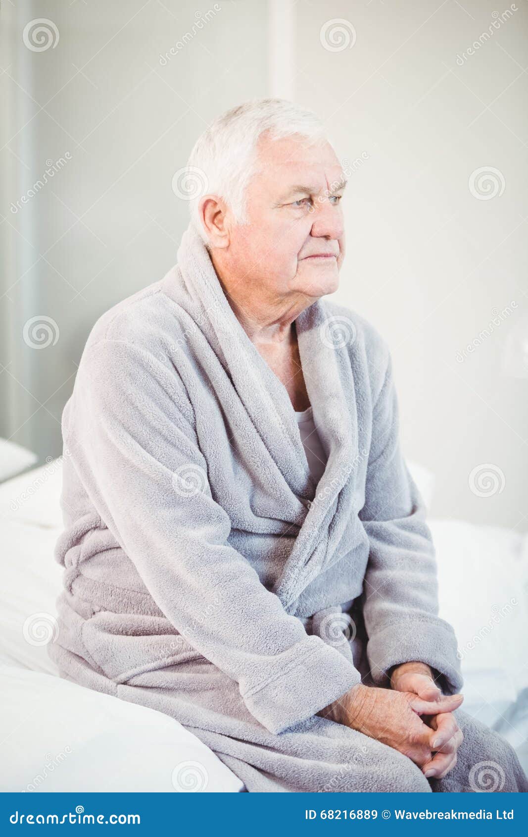 Thoughtful Senior Man in Bathrobe Sitting on Bed Stock Image Image of