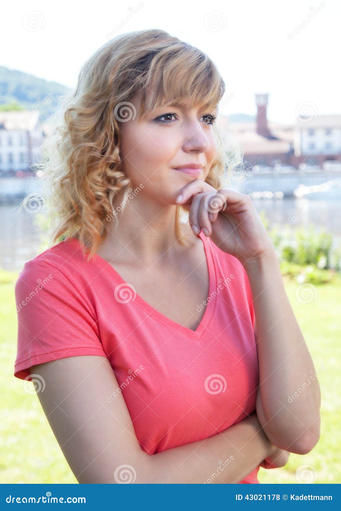Thoughtful Woman in a Pink Shirt Outside Stock Photo - Image of ...