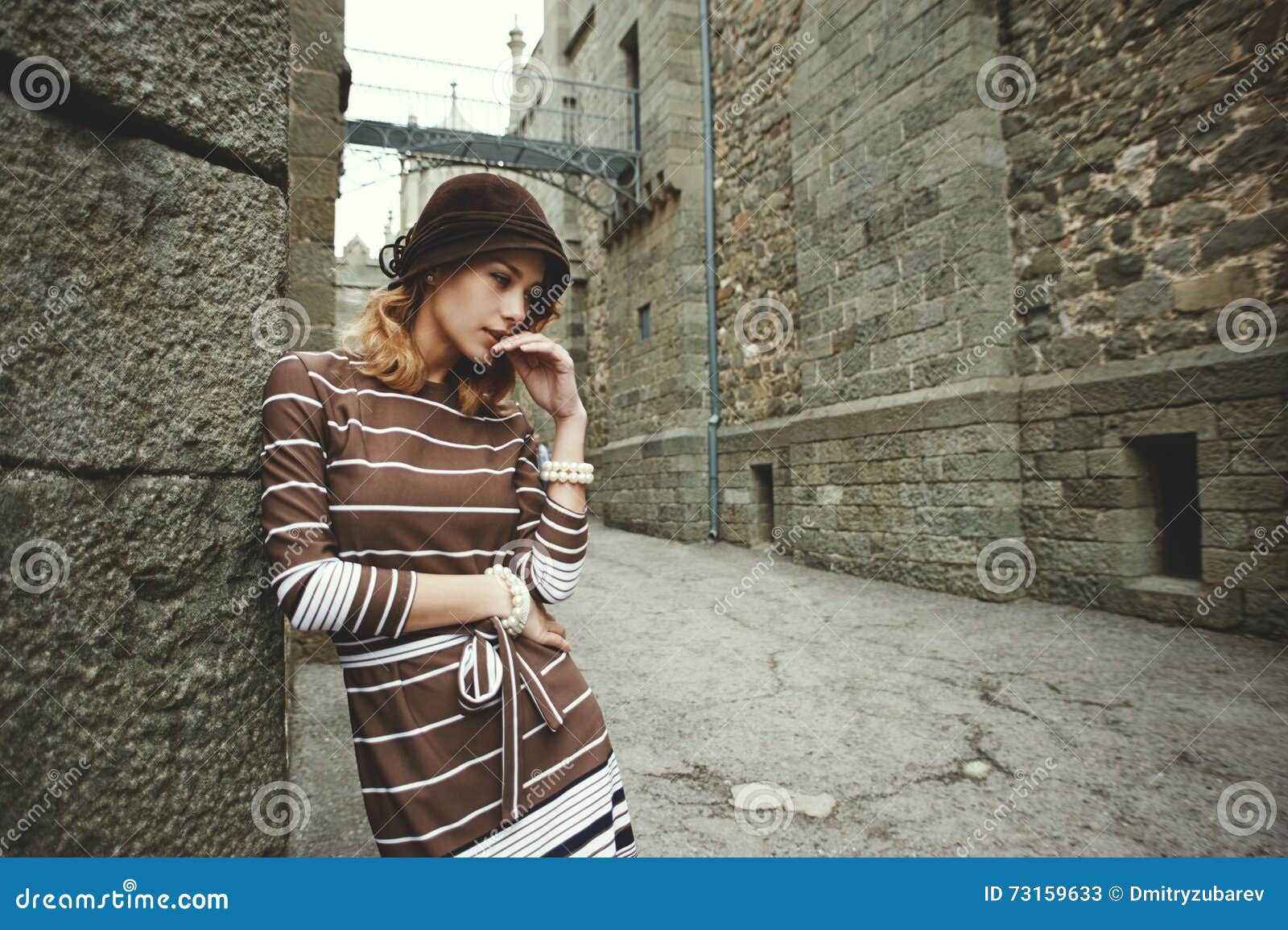 Thoughtful Woman Standing Leaning Against Wall of Ancient Castle Stock ...