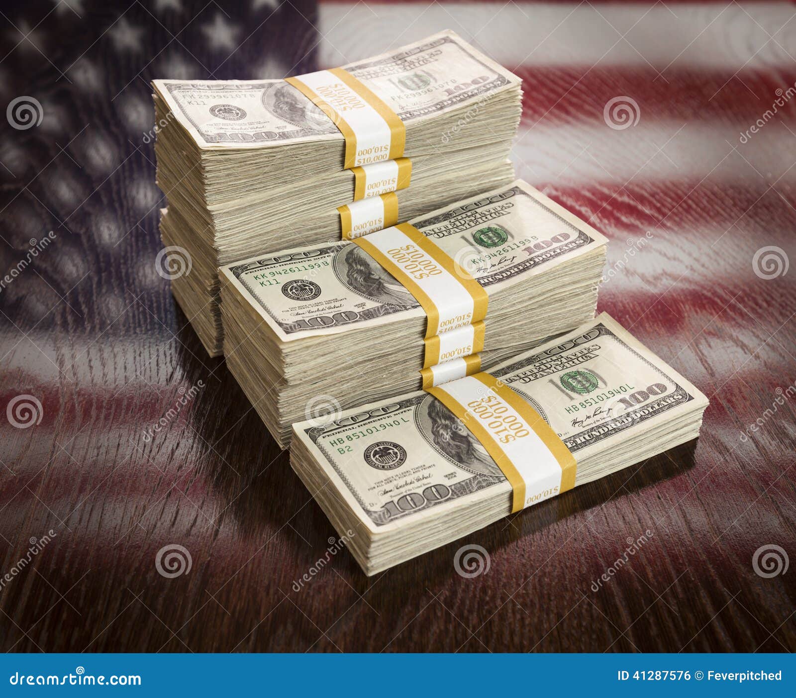 Thousands of Dollars with Reflection of American Flag on Table Stock Photo  - Image of pile, closeup: 41287576
