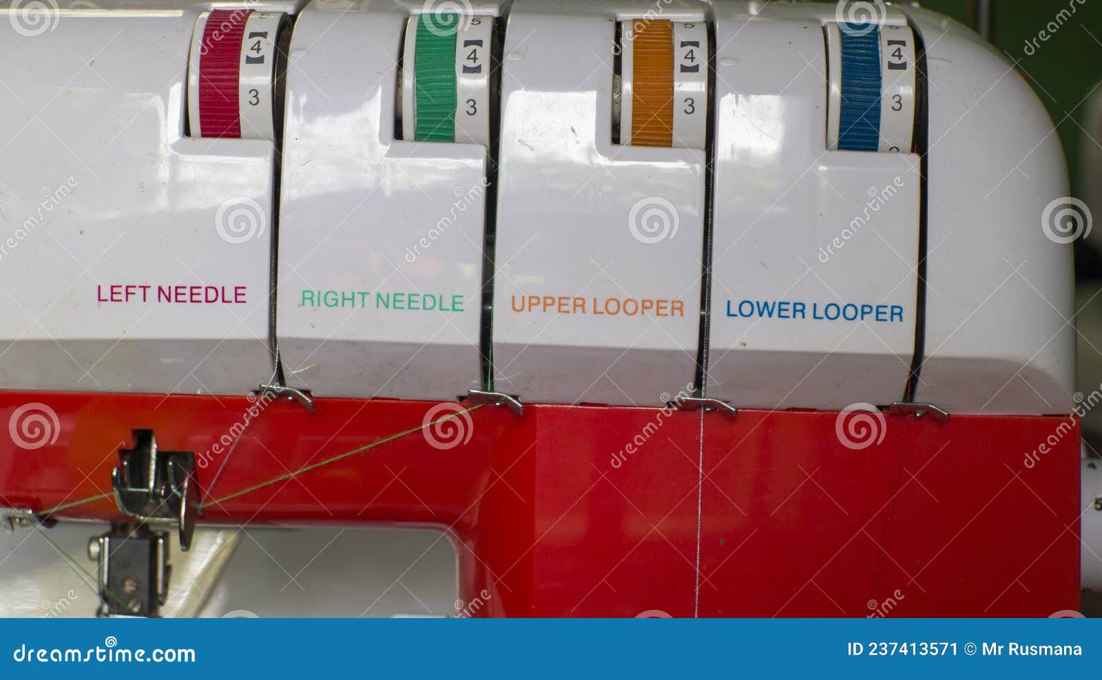 Thread Tension Setting on a Two Needle Overlock Sewing Machine. Stock