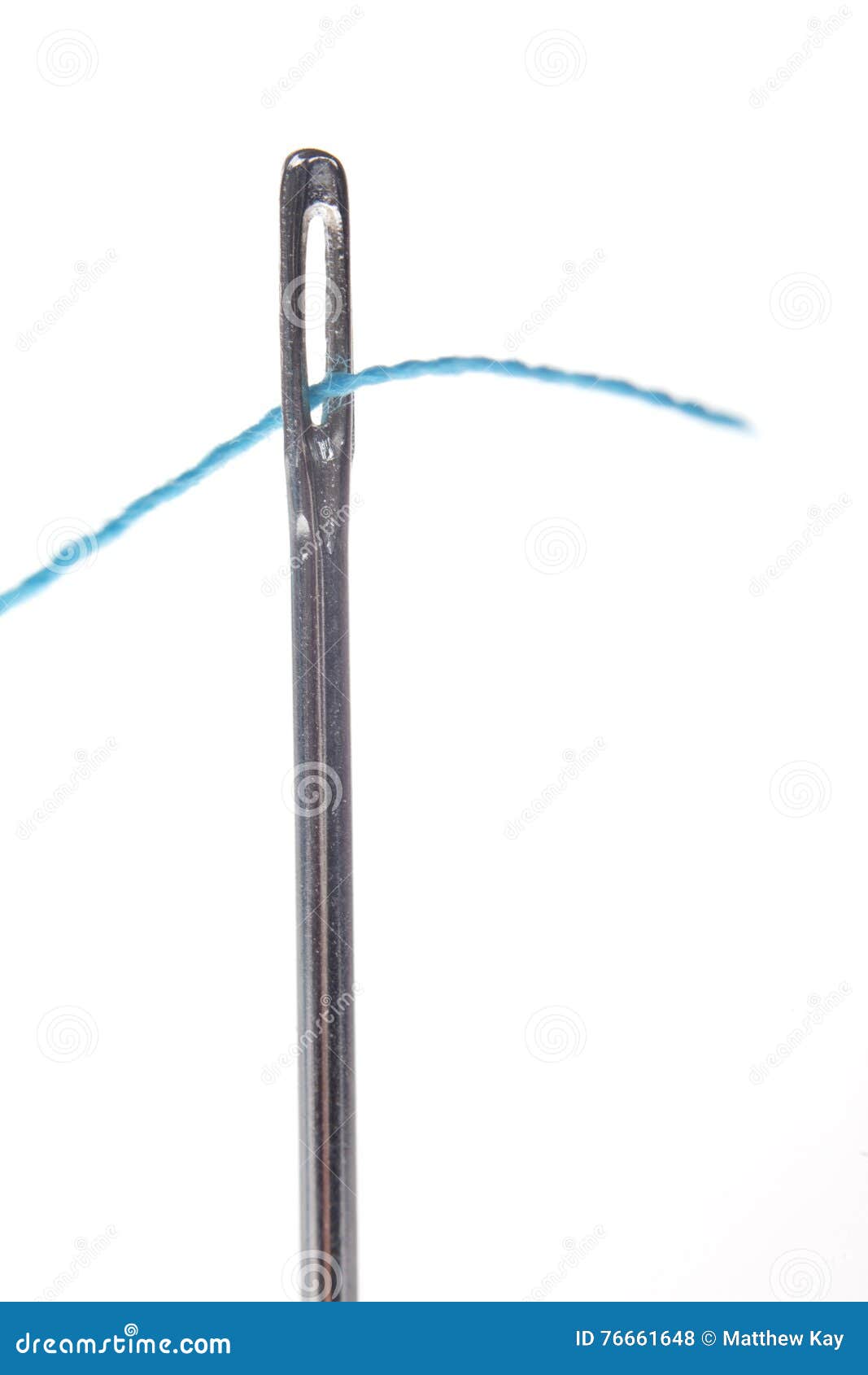 Threading a needle macro stock photo. Image of hobby 76661648