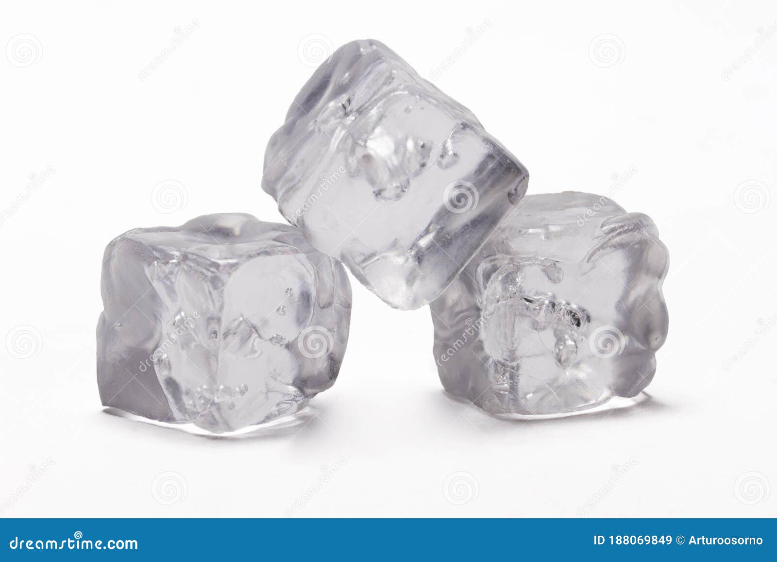 Acrylic Ice Cubes,Plastic Ice Cubes On Light Blue Background. Stock