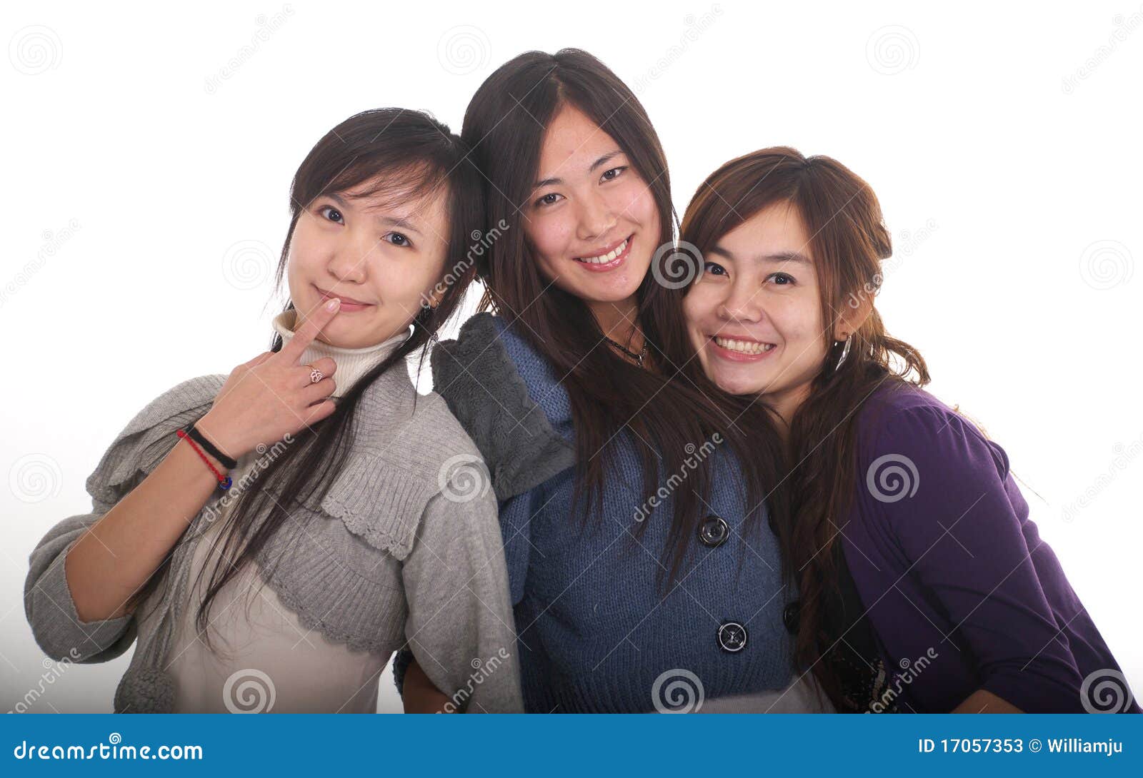 Three Asian girls isolated on white.