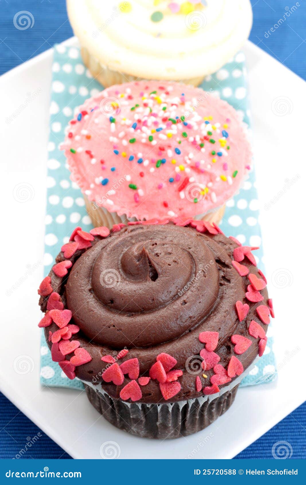 Three assorted cupcakes stock photo. Image of cafe, homemade 25720588