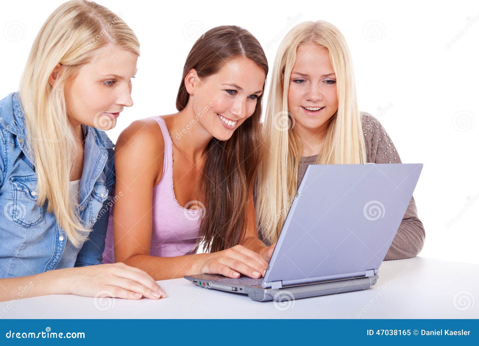 Three Attractive Girls Using Same Laptop Stock Image Image of girls