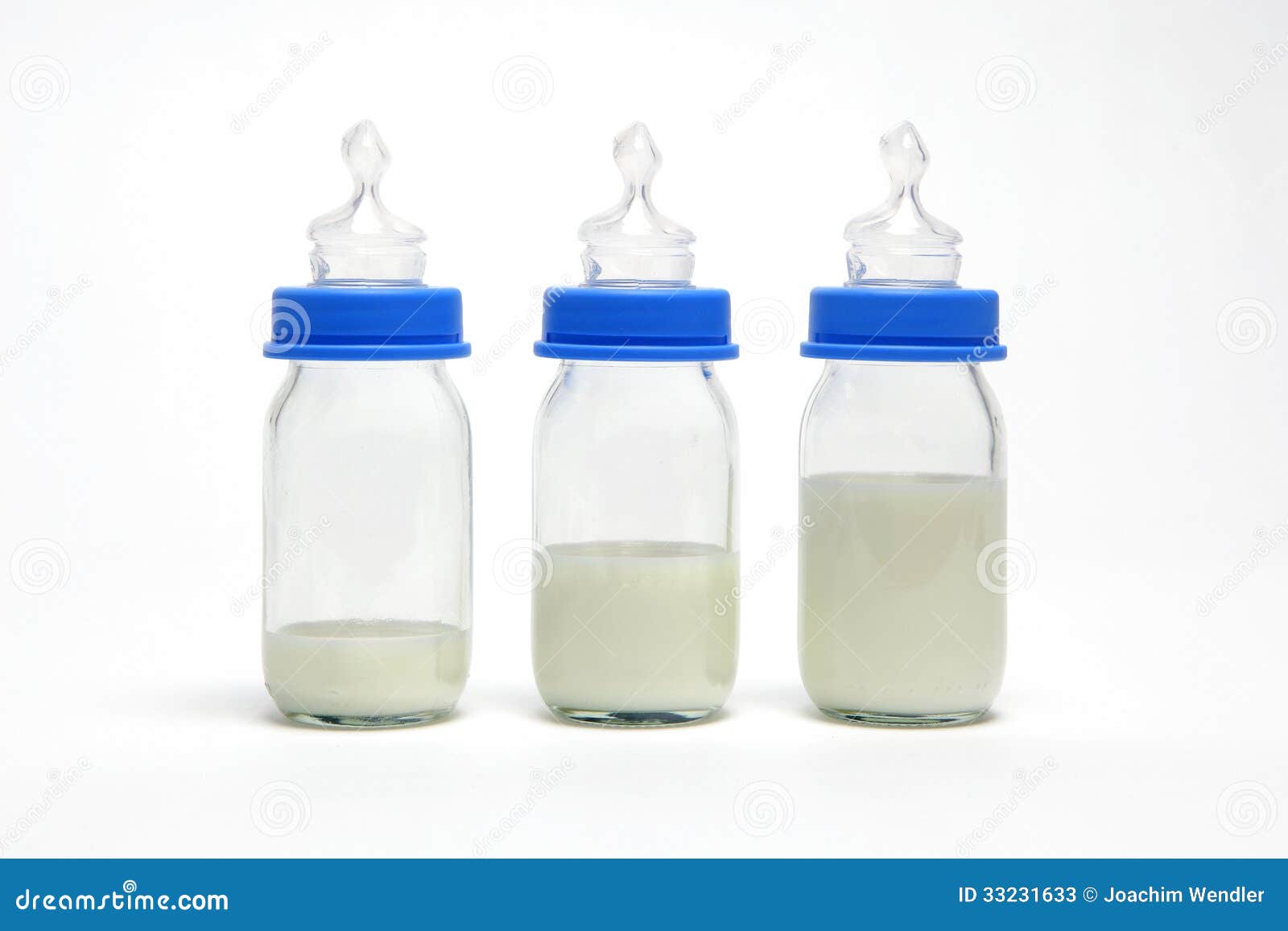 three baby bottles in a row