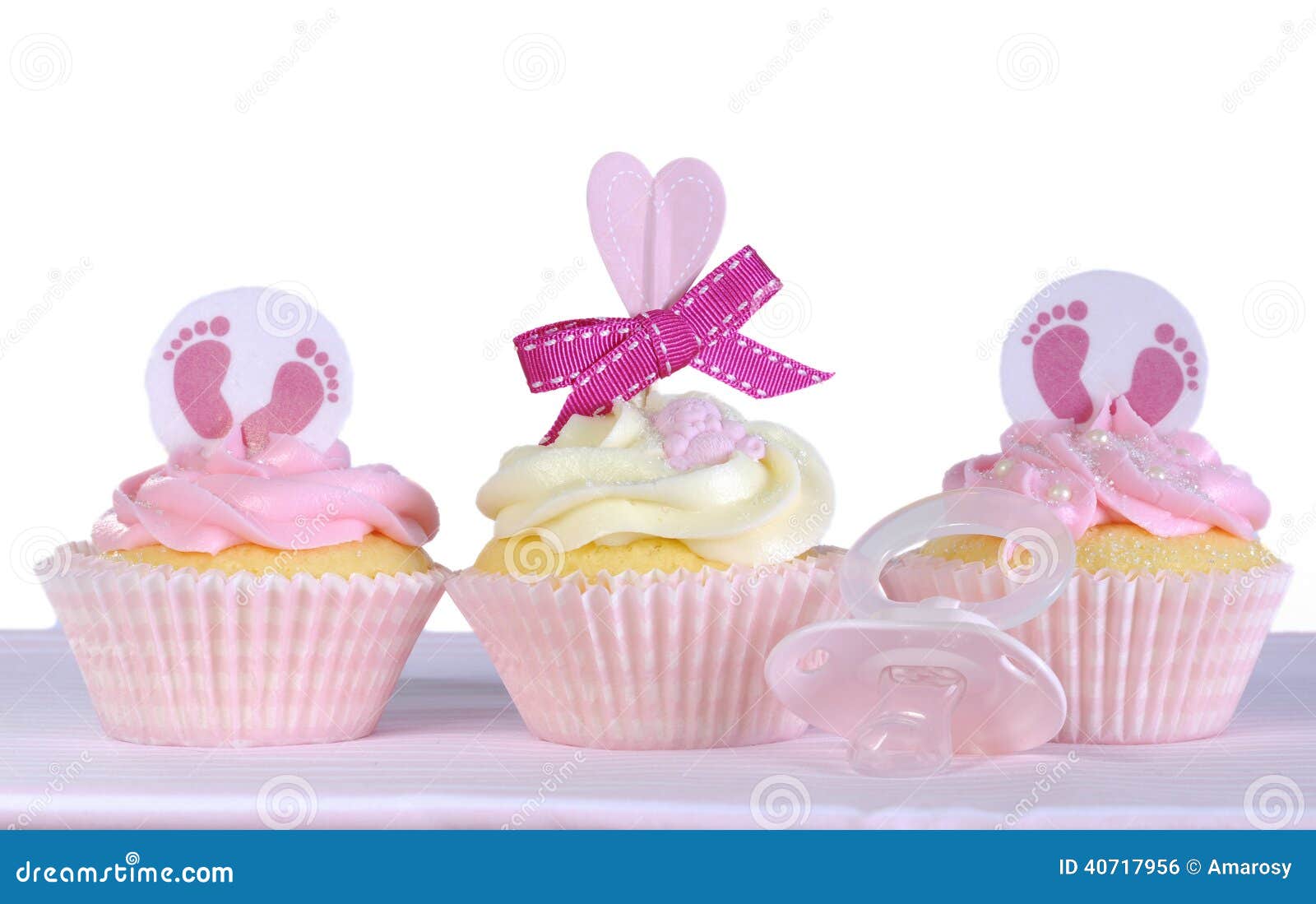 baby face cupcakes with pacifier