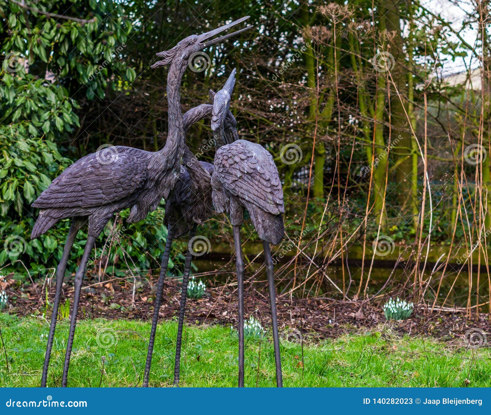 Three Beautiful Bird Statues In A Garden Backyard Decorations