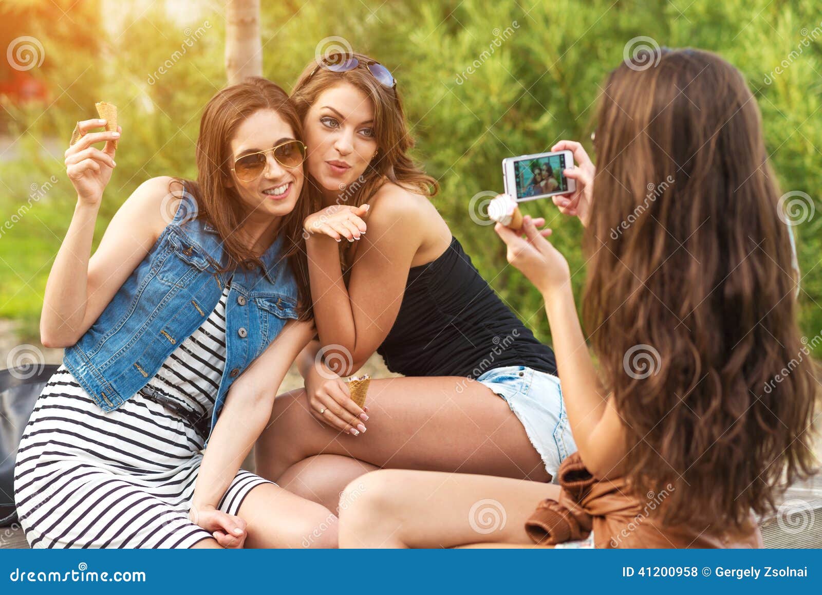 three beautiful girlfriends make: sending kiss photo