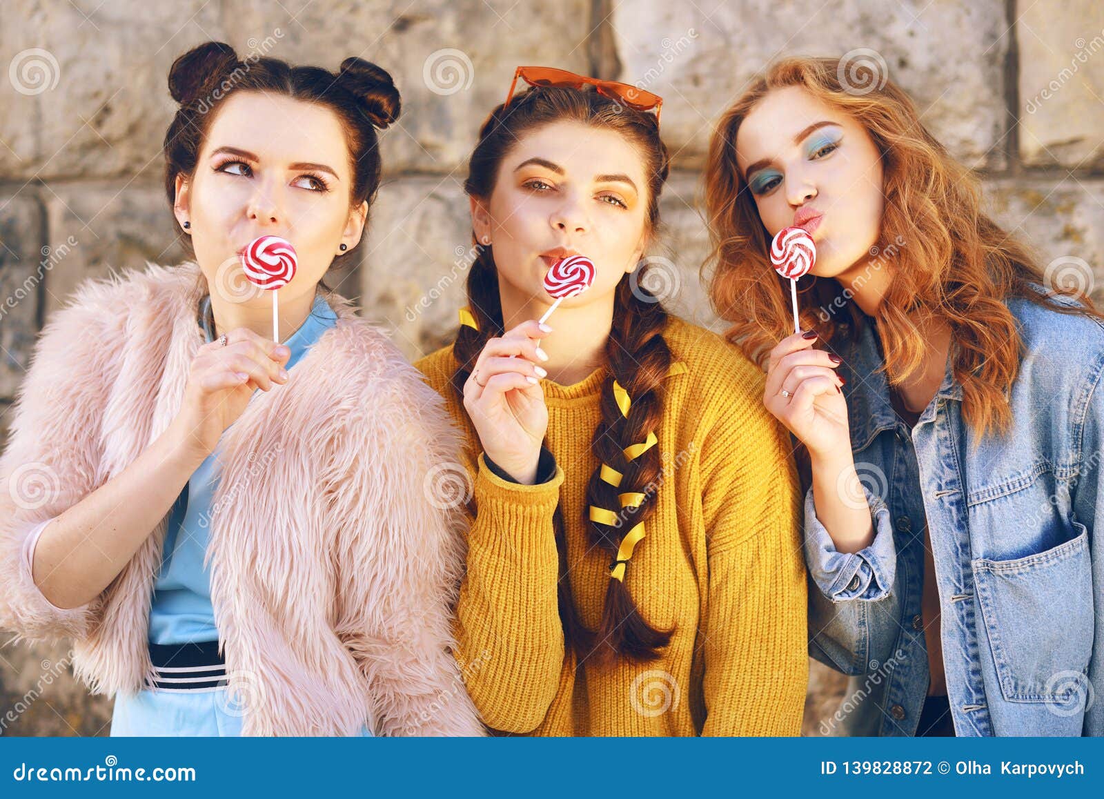 Three Beautiful Girls Models Eat Lollipops Girlfriends With