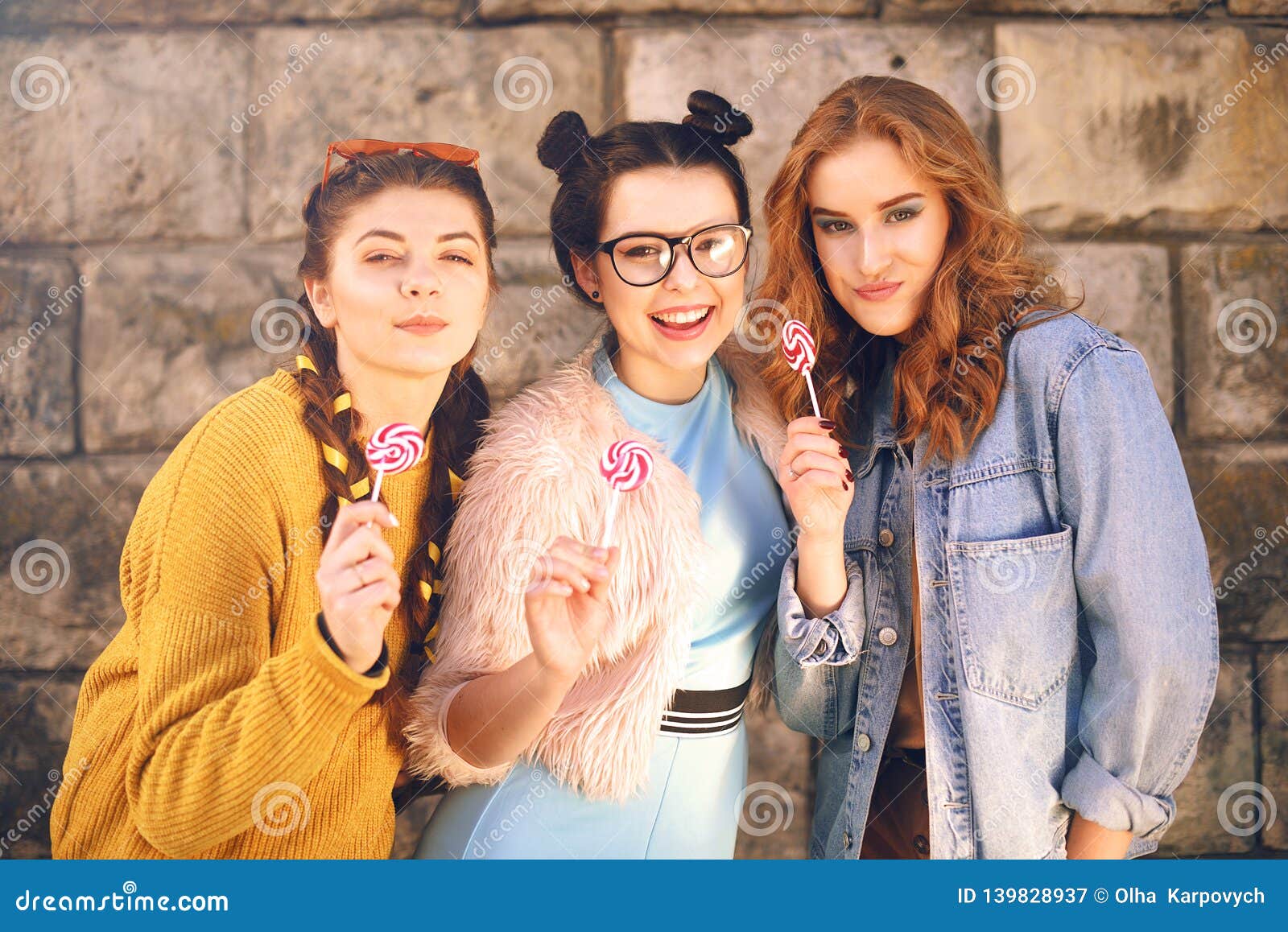 Three Beautiful Girls Models Eat Lollipops Girlfriends With