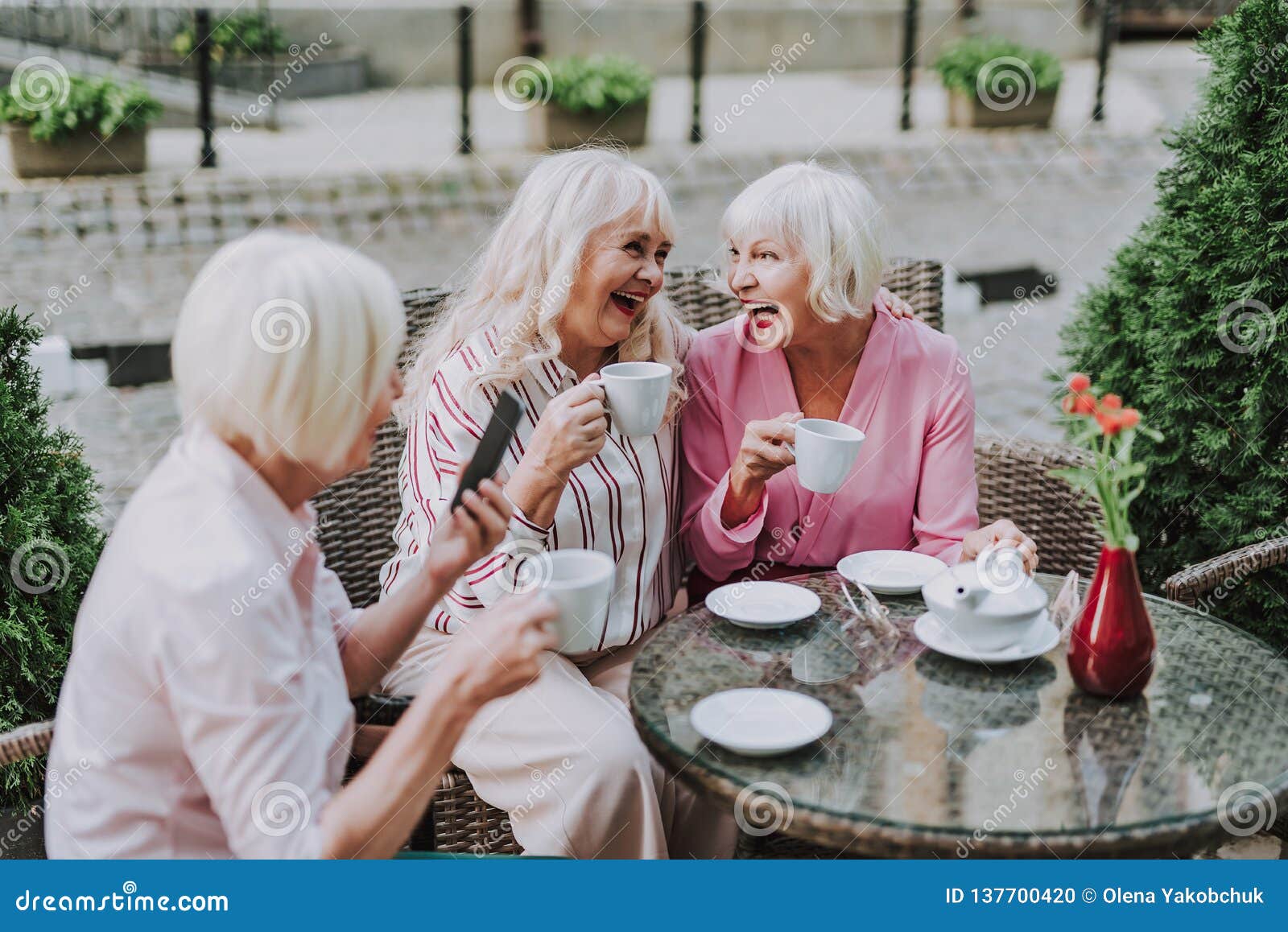Three Beautiful Older Women Having Fun Together Stock Photo