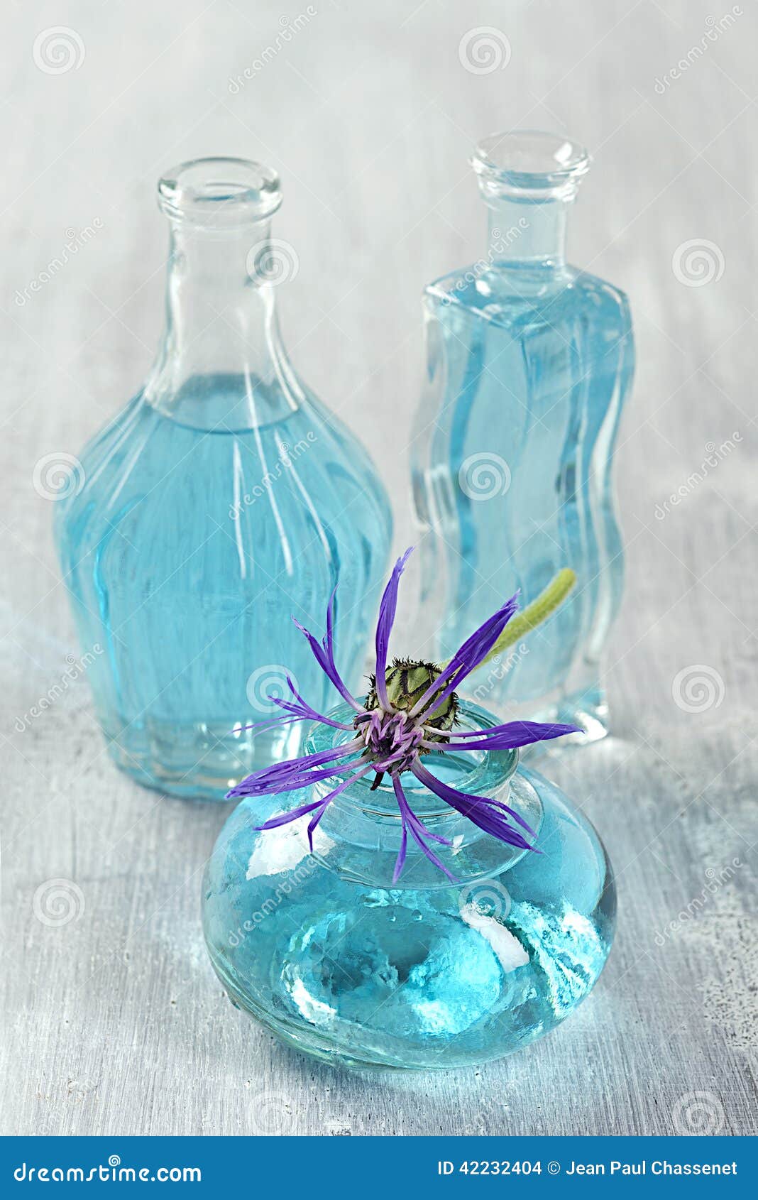 Three Blue Bottles of Cornflower Essential Oil Stock Photo Image of cosmetic, bottle 42232404