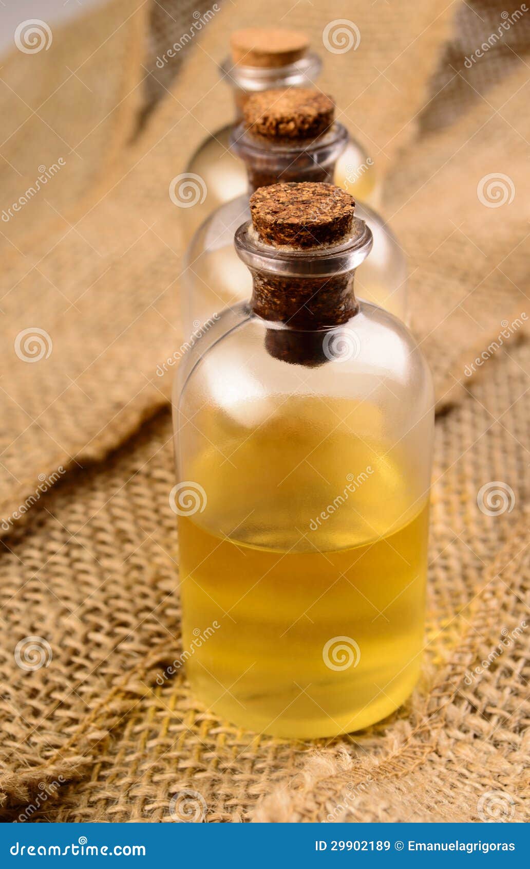 Three bottle of bath oil stock image. Image of glass 29902189