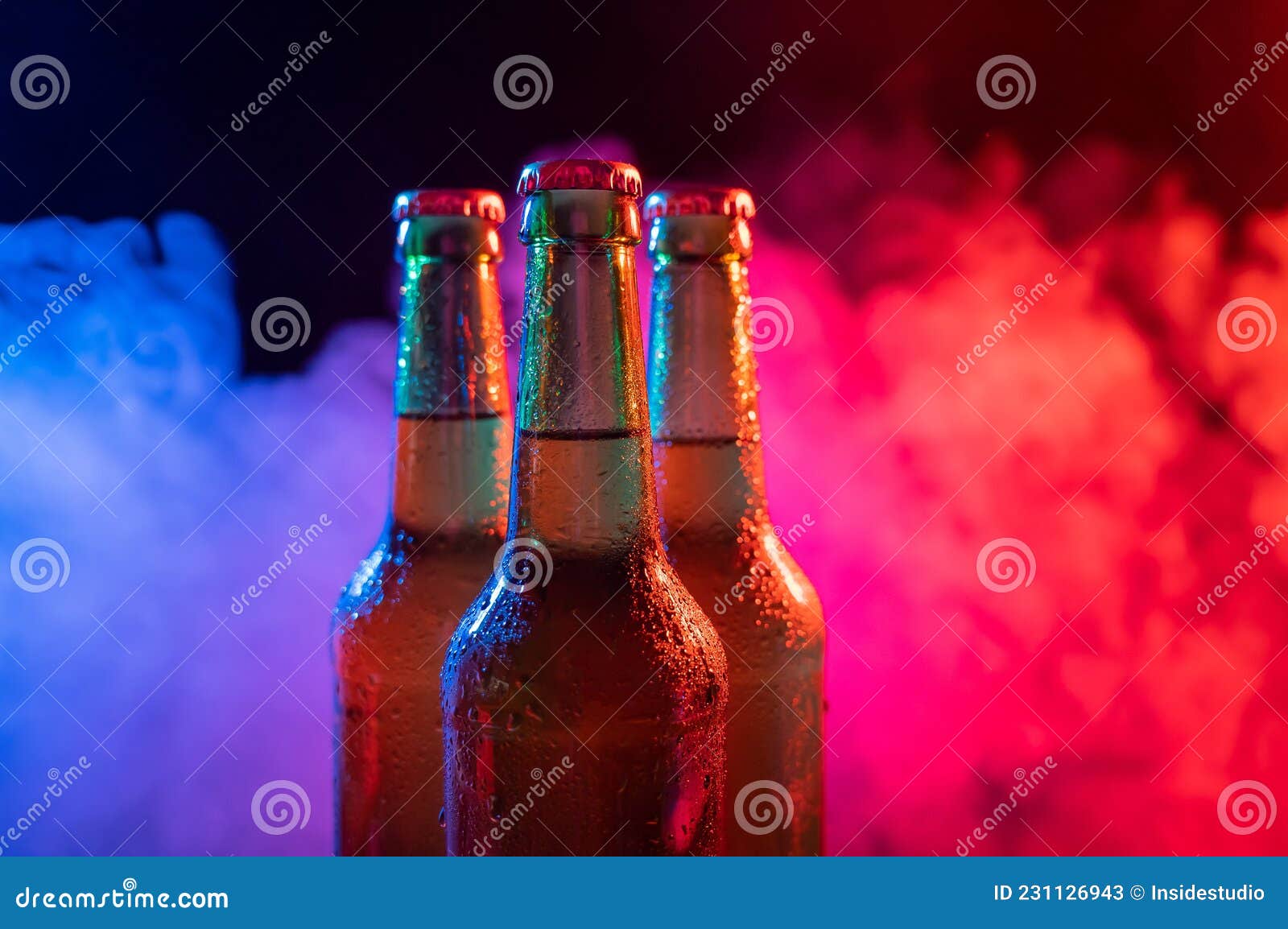 Three Bottles of Beer in a Bluepink Mist. Stock Image Image of pink, glow 231126943