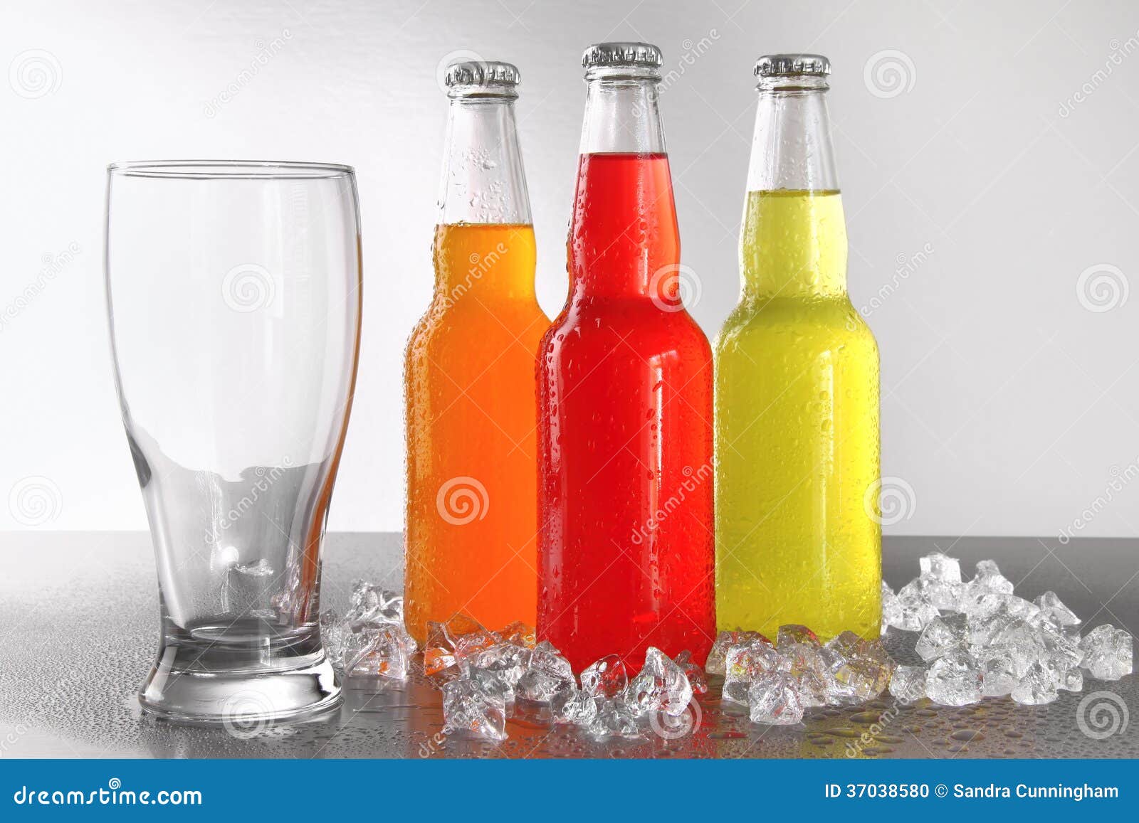 Three Bottles with Drinks with Glass and Ice Stock Photo Image of