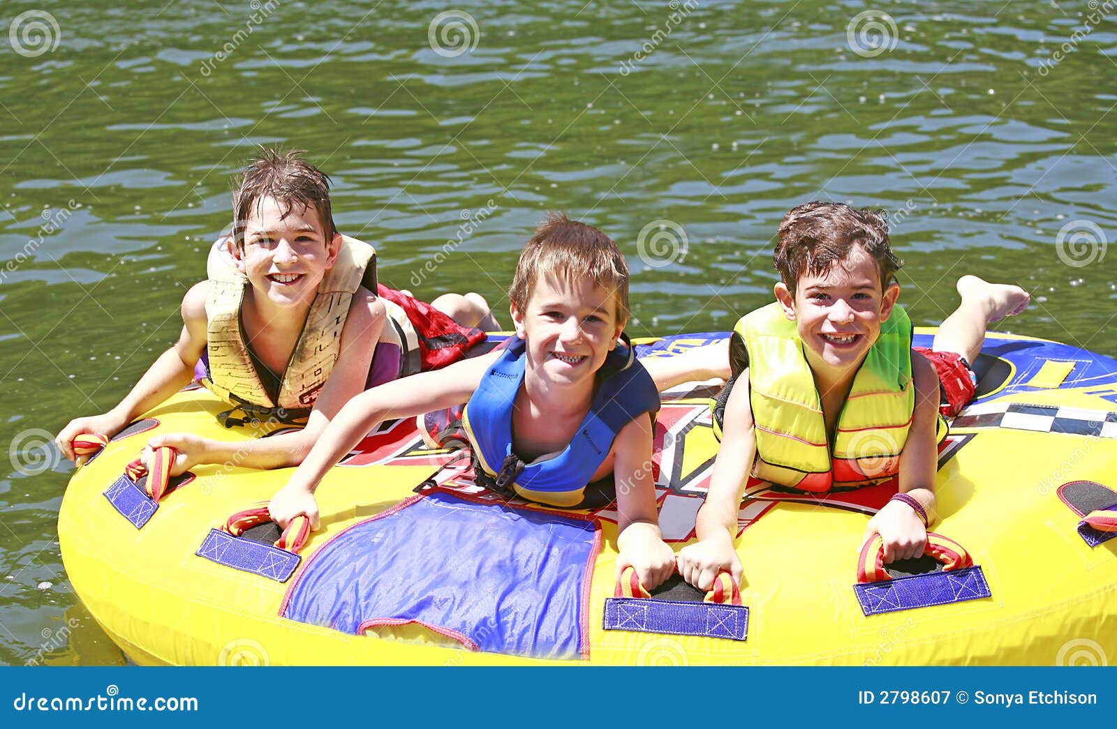 three boys tubing
