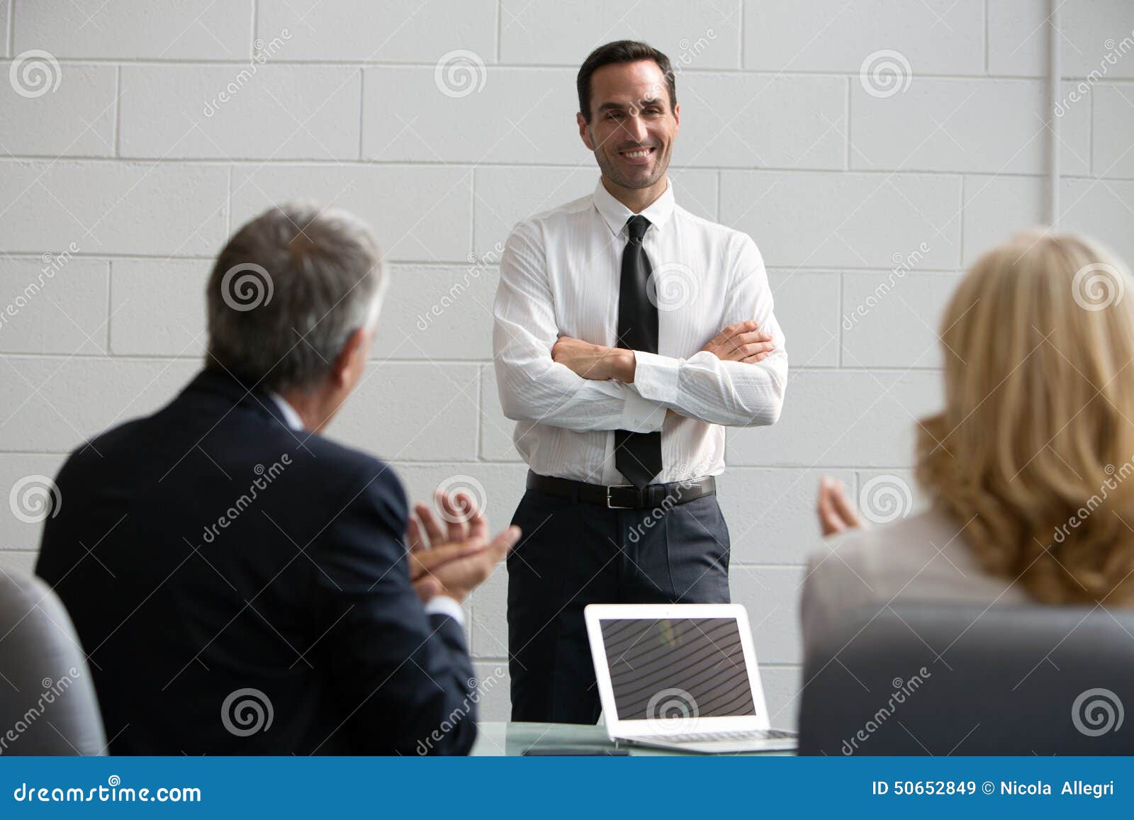 three businesspeople during a meeting