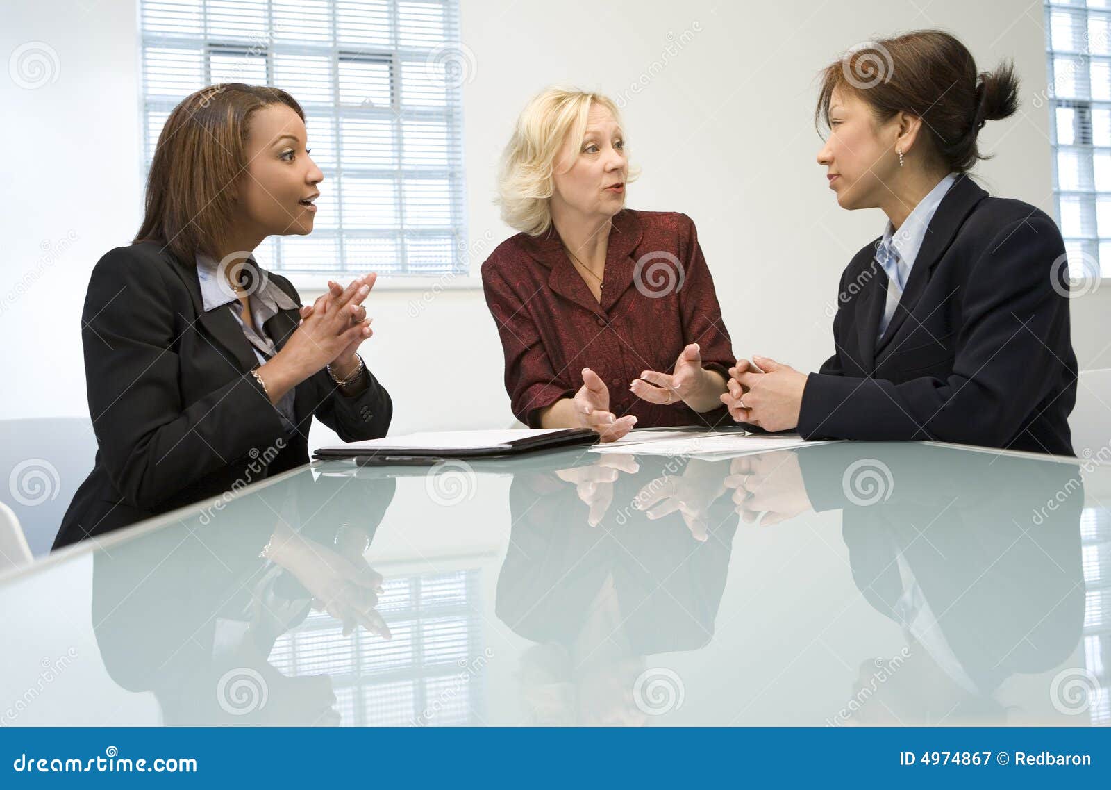 three businesswomen in meeting