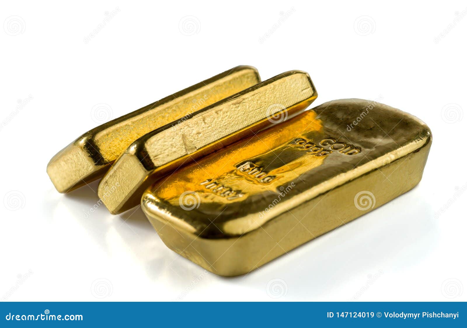 three cast gold bars, the typical form of bullion gold bullion.