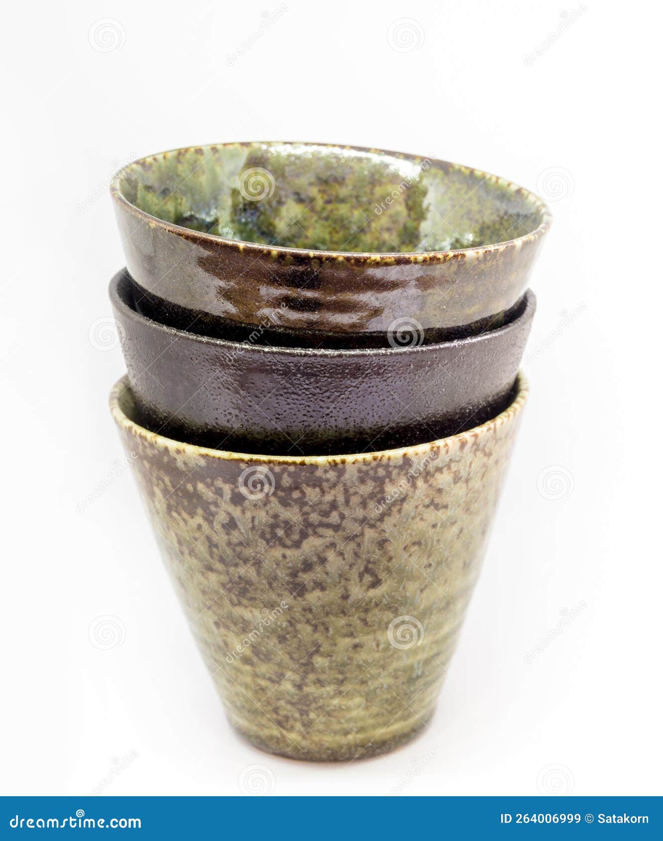 Three Ceramic Cups of the Same Shape but the Pattern is Different Stock