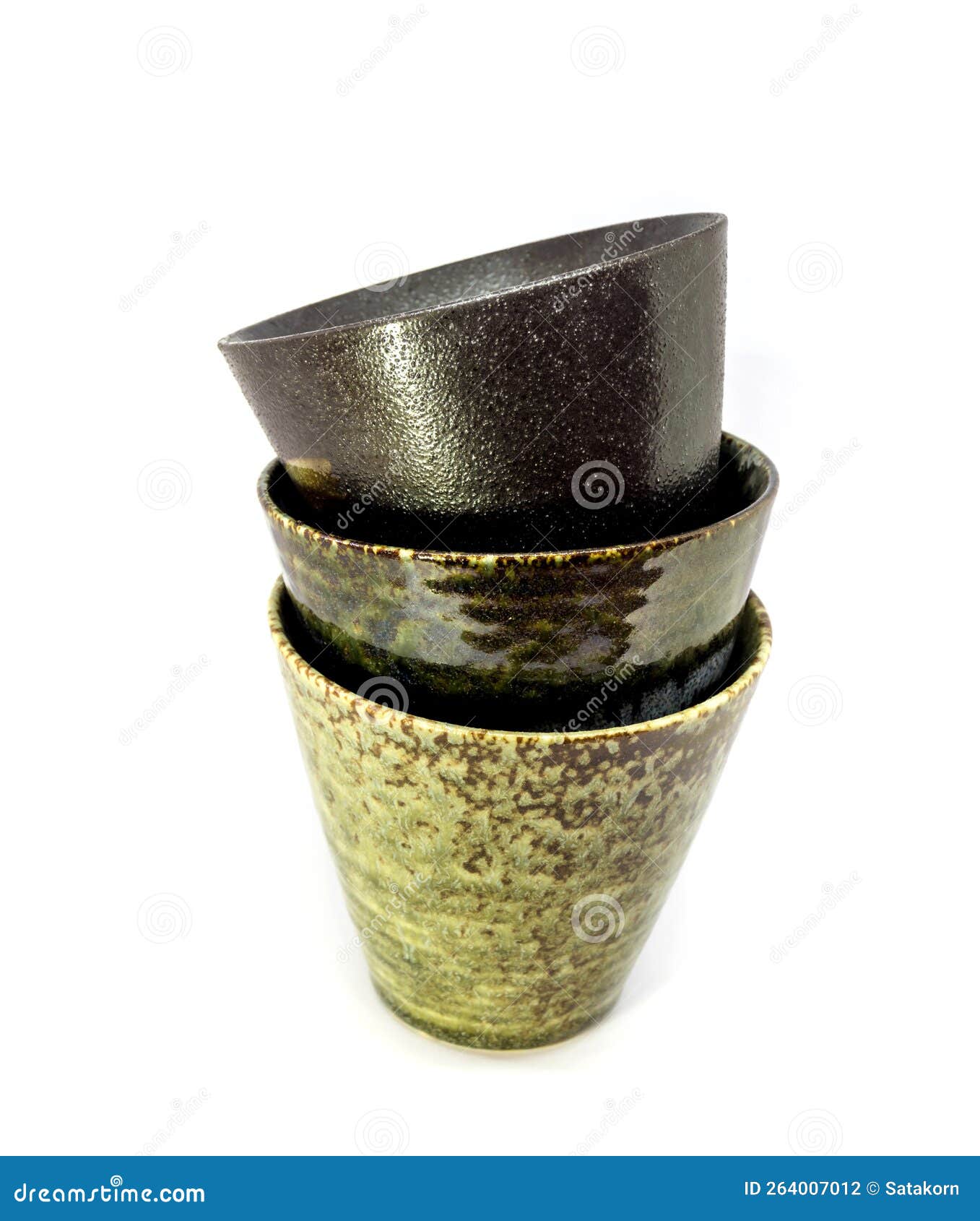 Three Ceramic Cups of the Same Shape but the Pattern is Different Stock