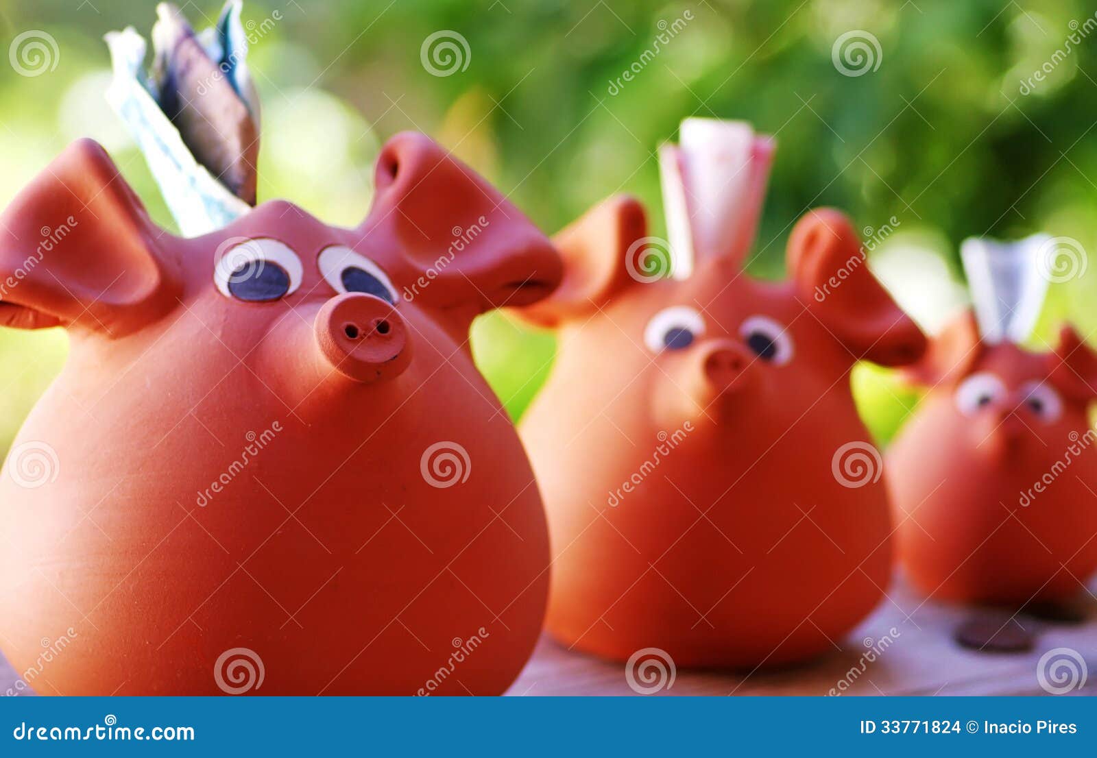 three ceramic piggy
