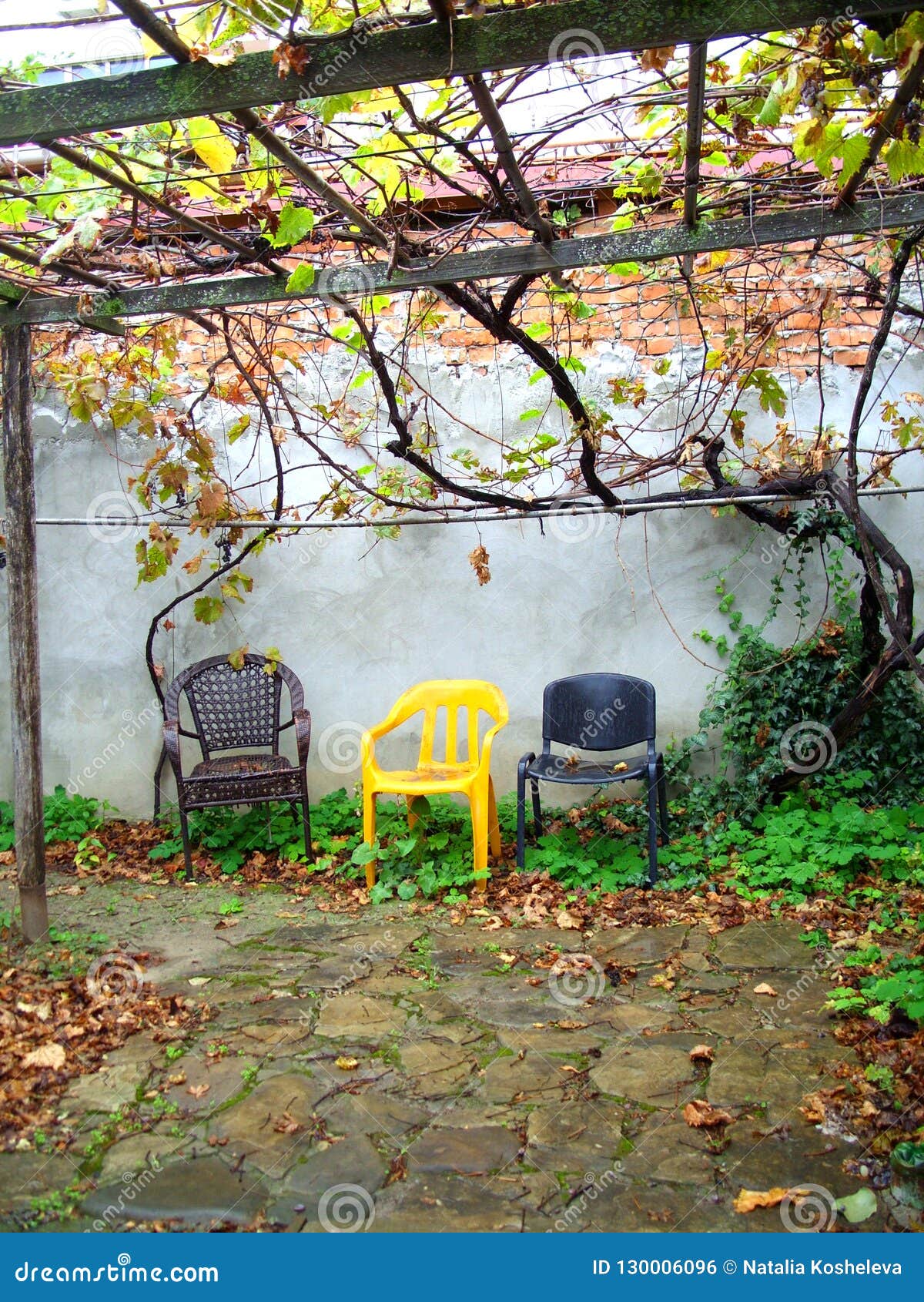 Three Chairs Against the Wall Stock Photo Image of brick, autumn