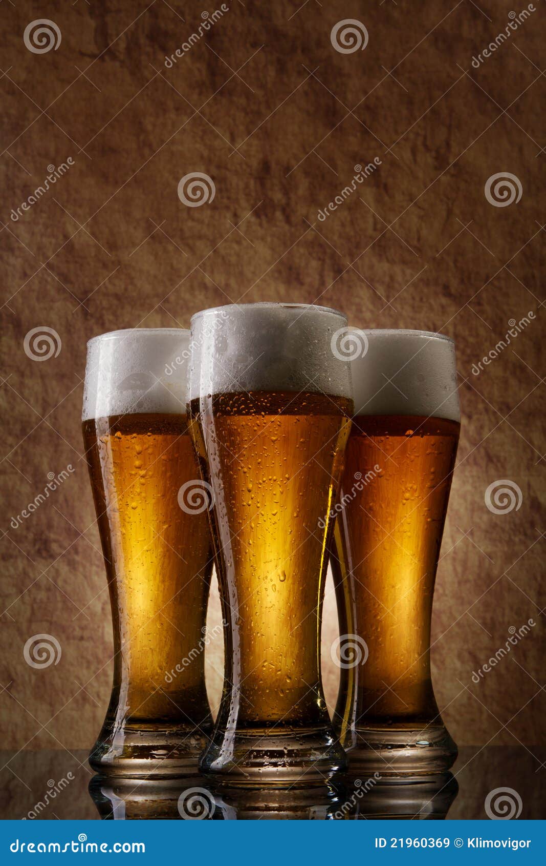 Three Cold Beer into Glass on a Old Stone Stock Image Image of full
