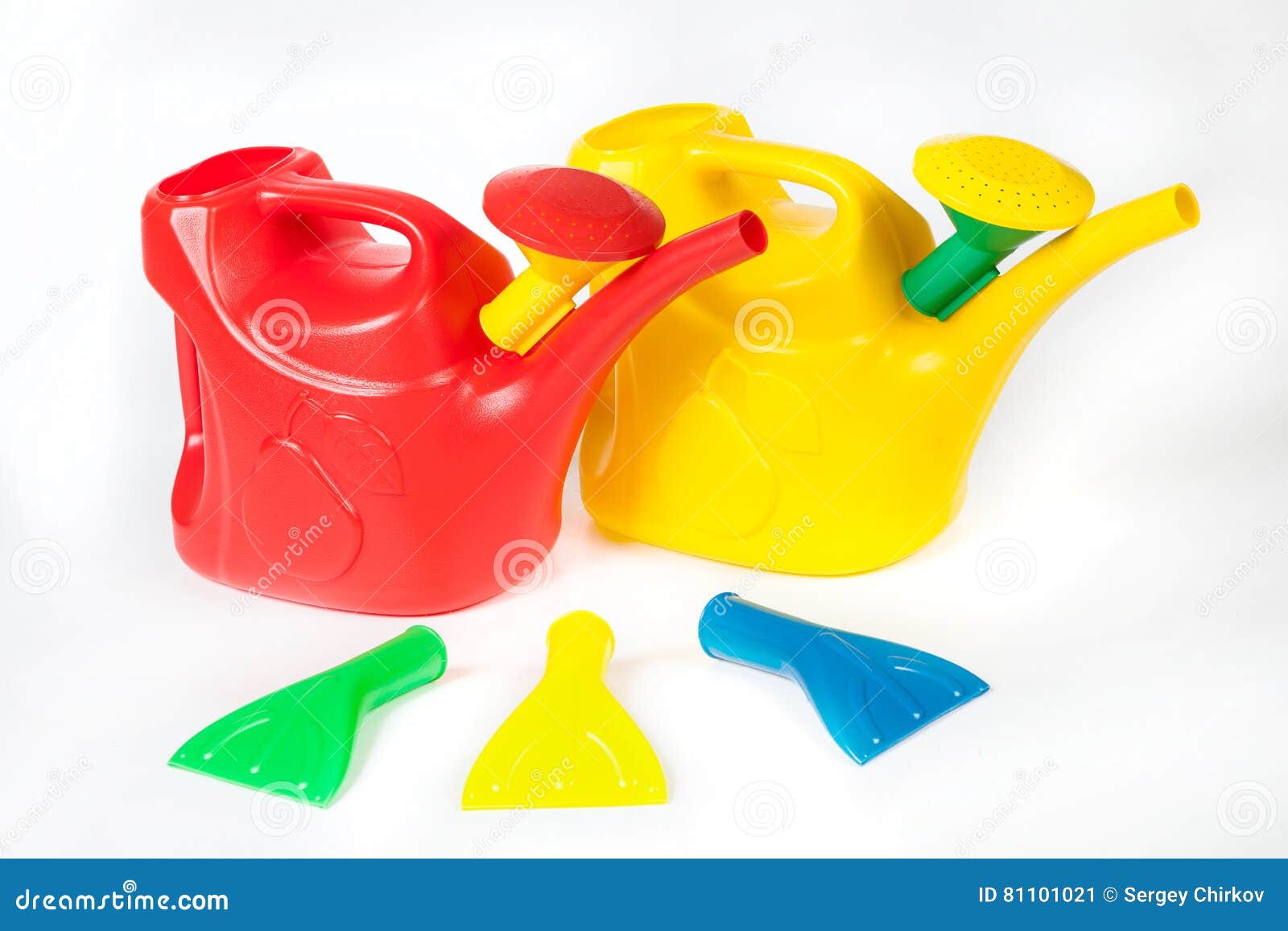 Three Color Plastic Watering Cans with Replaceable Nozzles Stock Image