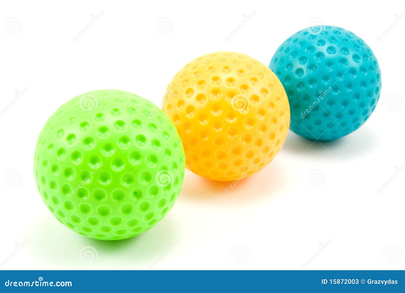 Three colored golf balls stock image. Image of activity 15872003