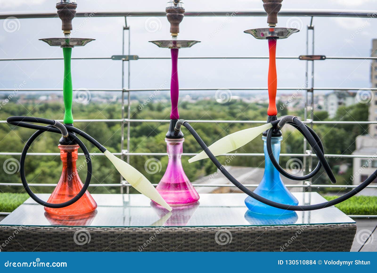 Three Colors Hookahs on Table in Hookah Lounge in a Day. Stock Photo Image of hookah, orange
