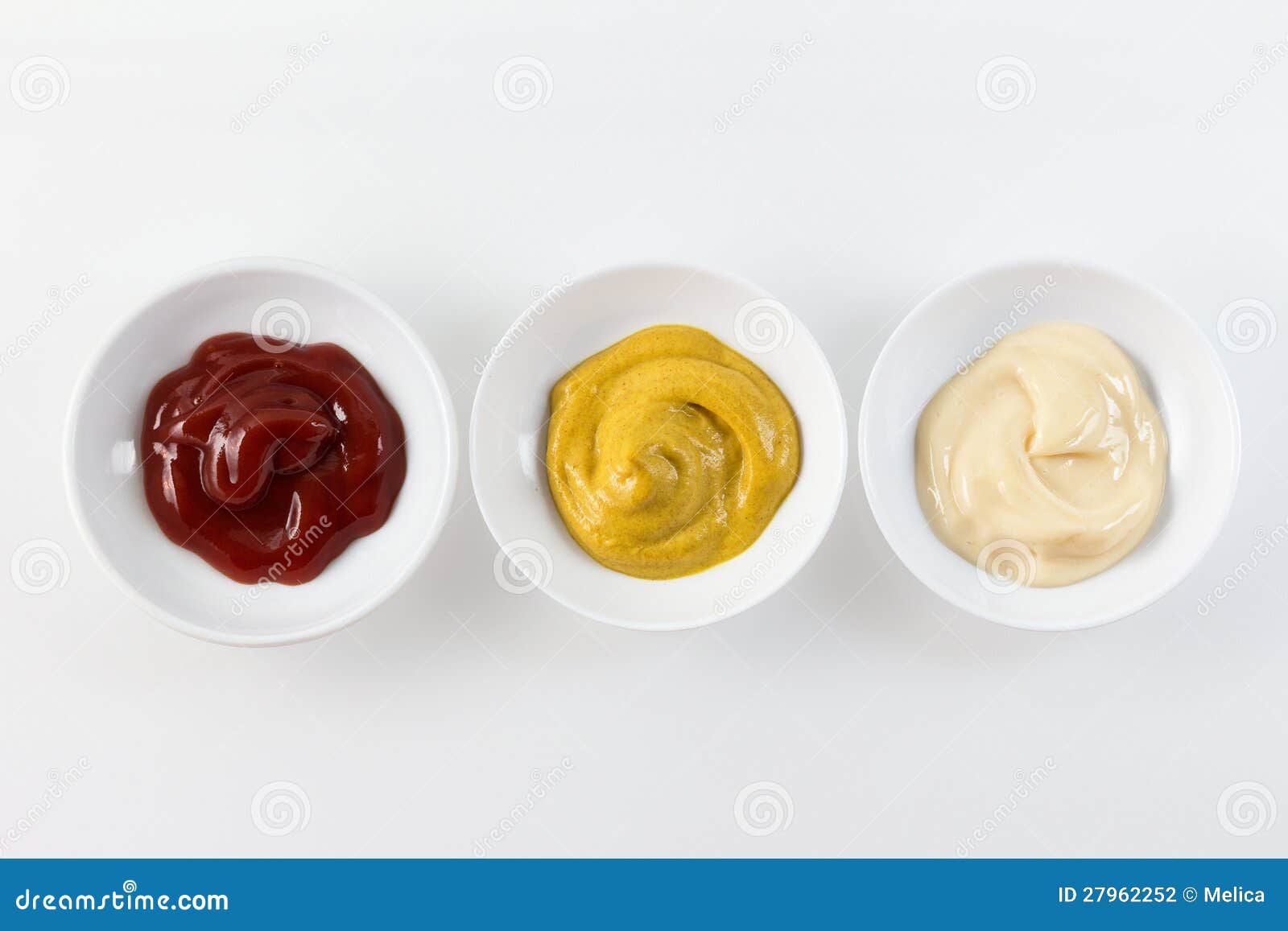 three condiment bowls