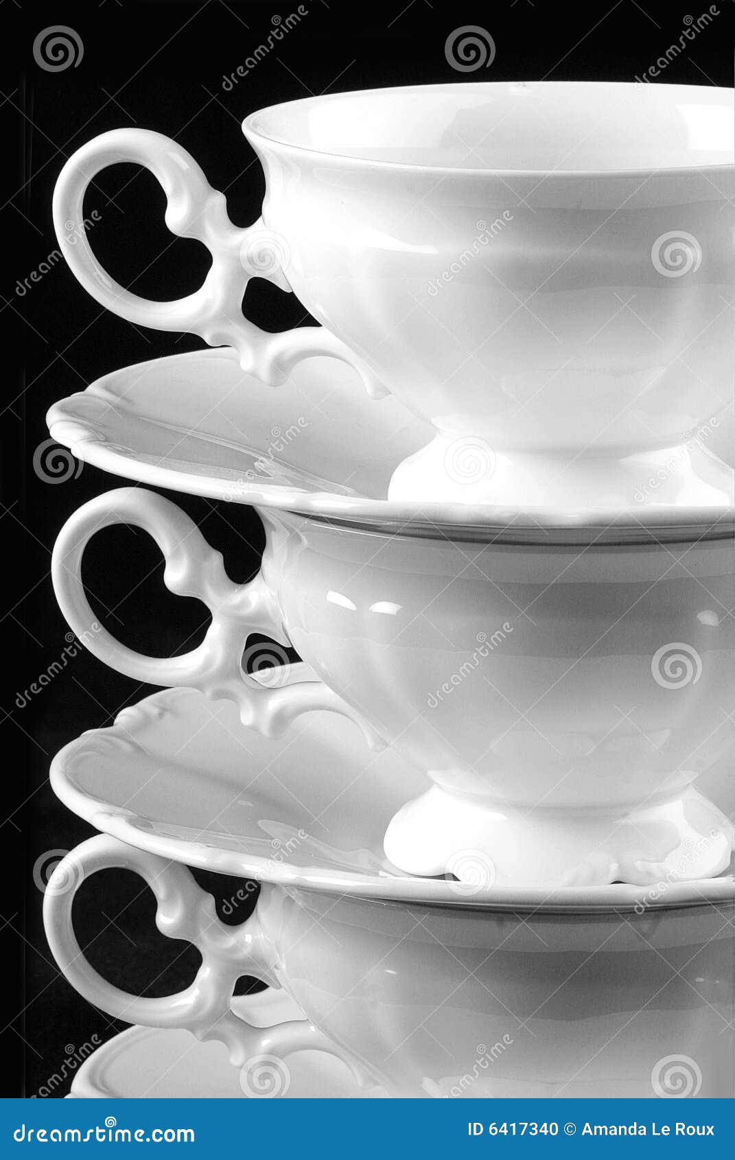three cups and saucers